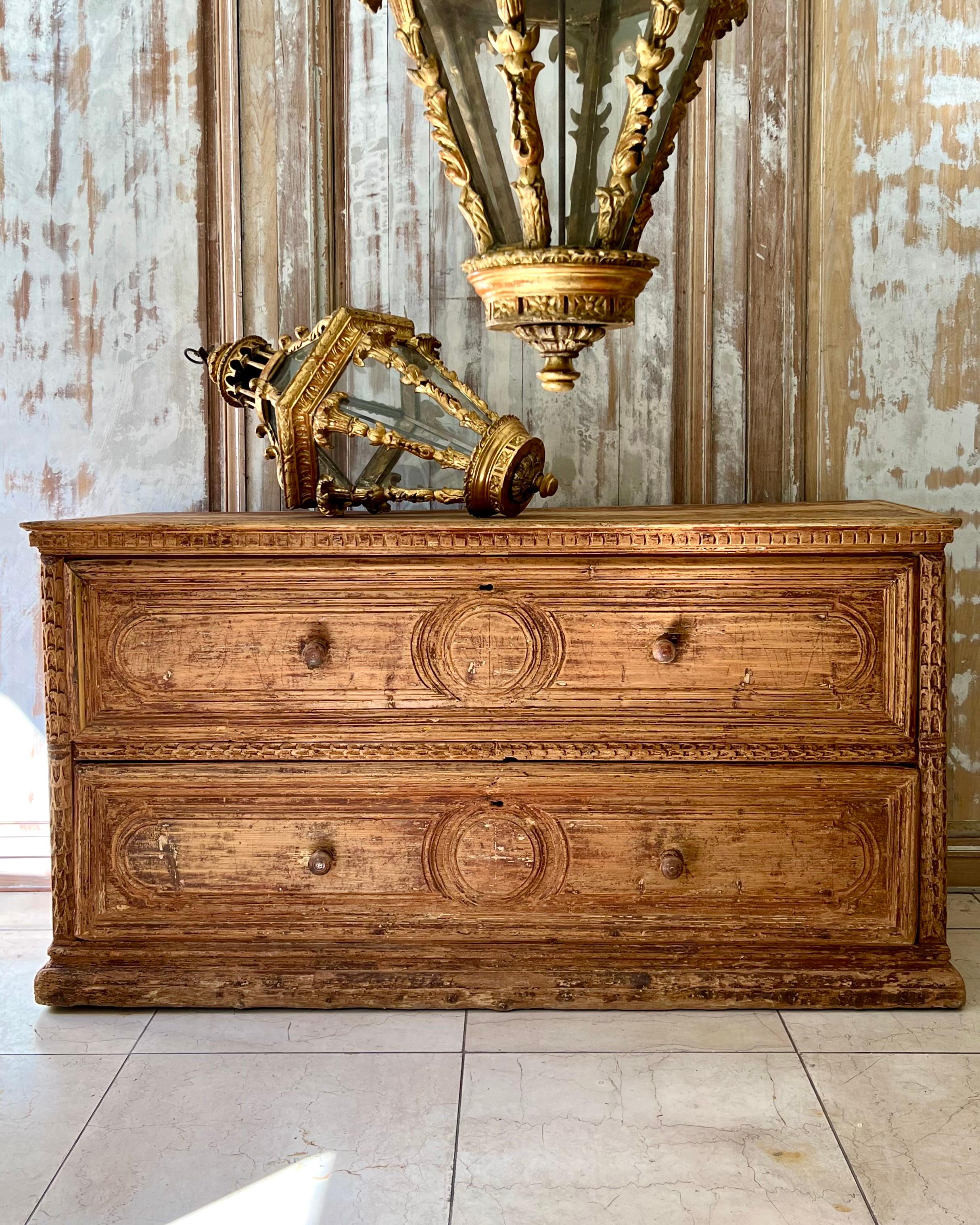 Large and very rare 18th century Italian Sacristy Commode in original, now patinated oak wood with two very deep carved front drawers - used in a sacristy to keep the liturgical clothes appropriately.
Italy 1700:s
