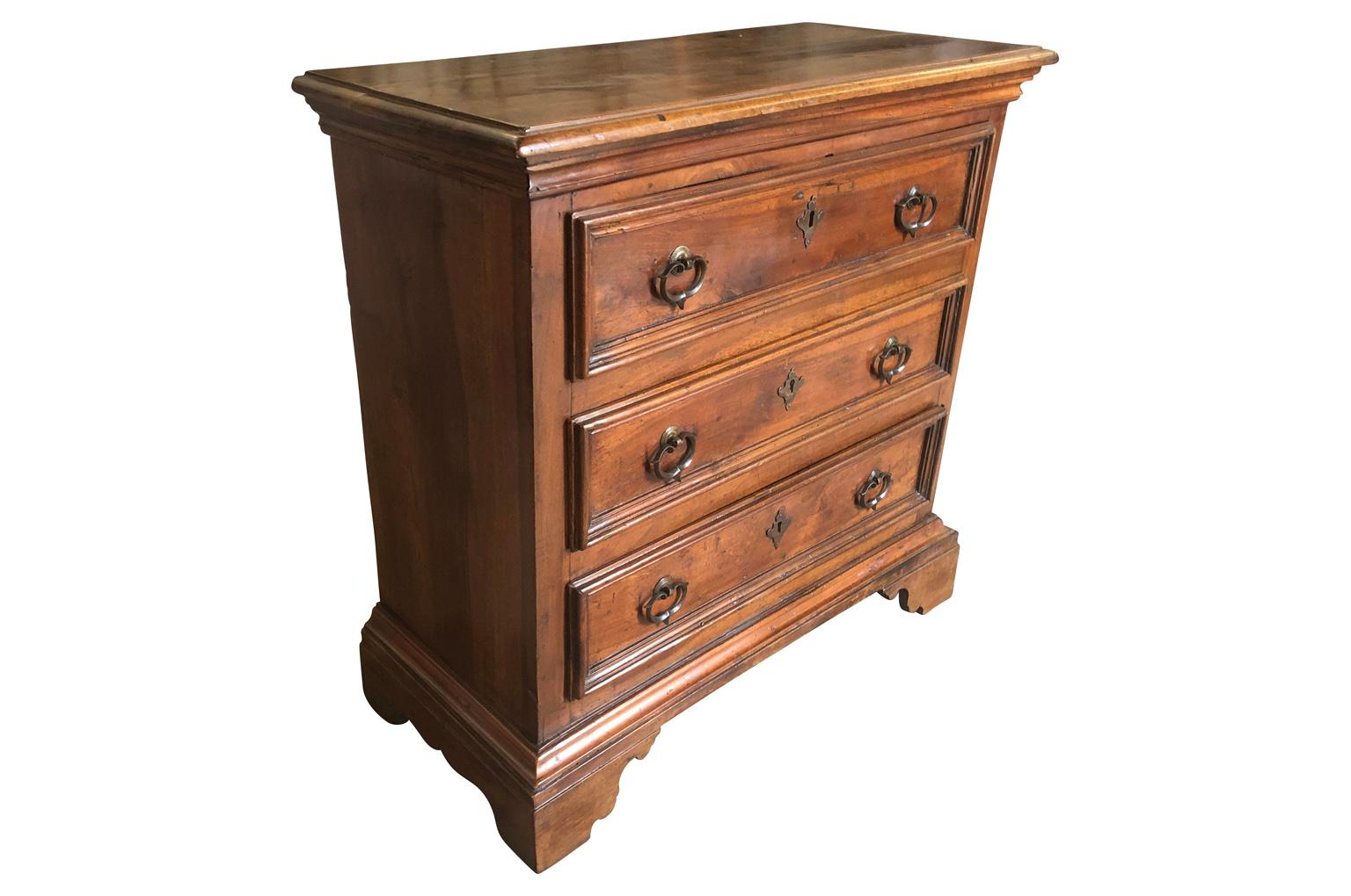 A very lovely 18th century commode from the Lombardi region of Italy. Soundly constructed from walnut. Wonderful patina. Three drawers over bracket feet.