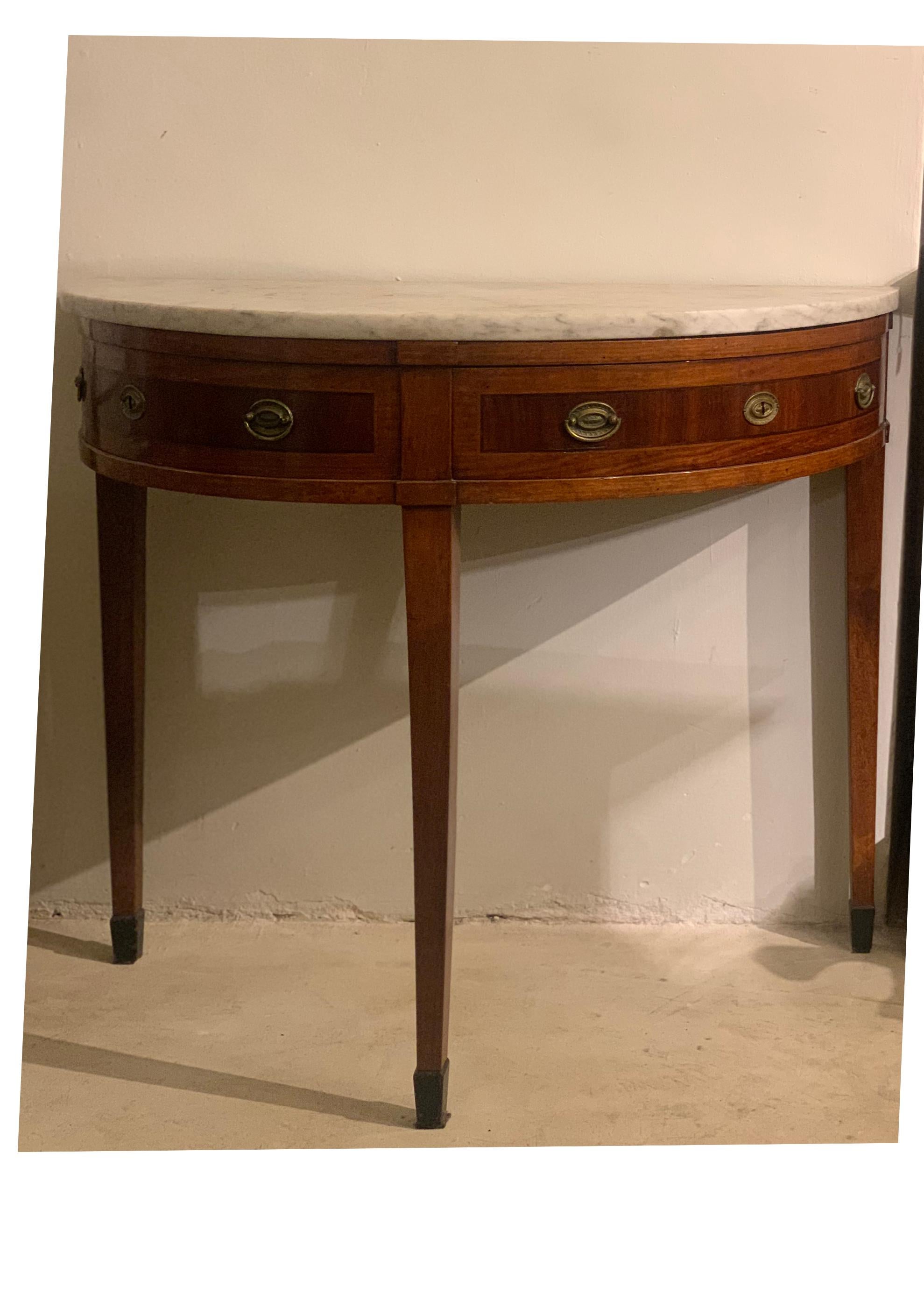 BEAUTIFUL TUSCAN WALL CONSOLE WITH CARRARA MARBLE TOP AND WALNUT WOOD UNDERSIDE WITH CHERRY WOOD FINISHES. Very particular is the opening of the two drawers that rotate around a pin so that they can be fully exploited without having the risk of them