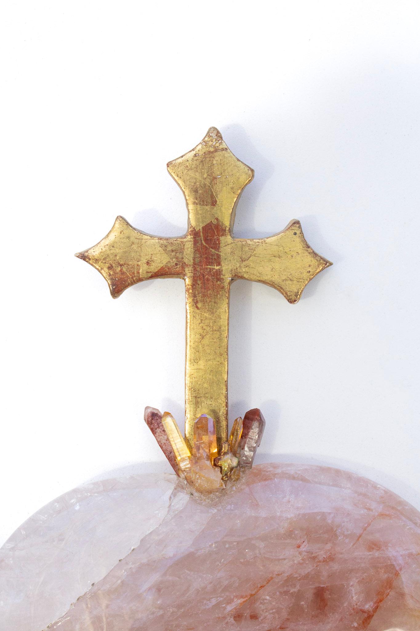 18th century Italian cross mounted on a polished pink hematite quartz heart and adorned with aurora (sunset) quartz and a natural-forming cross shaped baroque pearl. 

The 18th century crucifix artifact was originally an architectural piece from an