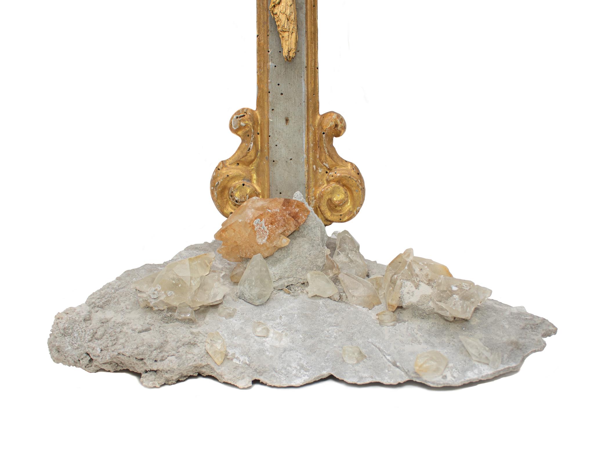 18th century Italian crucifix with gold-plated kyanite, calcite crystals in matrix, and baroque pearls. The crucifix is originally from a church in Liguria. It is hand-carved and painted with grey pigments and the sunburst and details are gold
