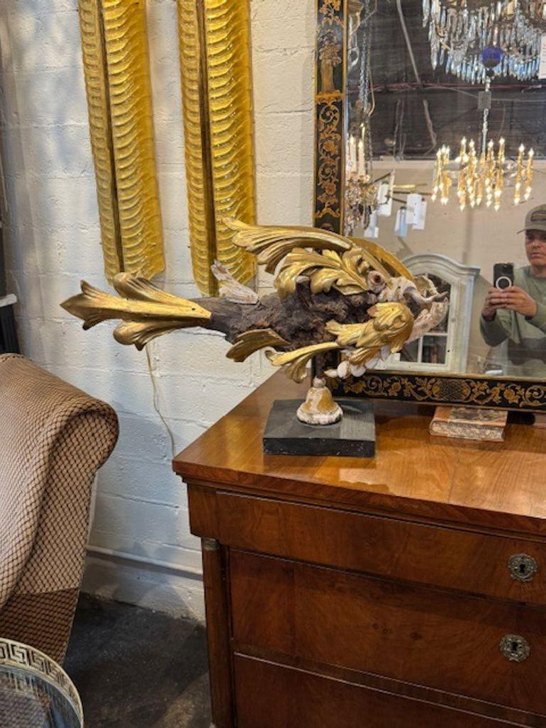 Antique fish sculpture made of 18th century fragments. (Recently assembled and put on a base). An interesting piece that is sure to spark a conversation! Circa 1870
28w x 8d x 17h