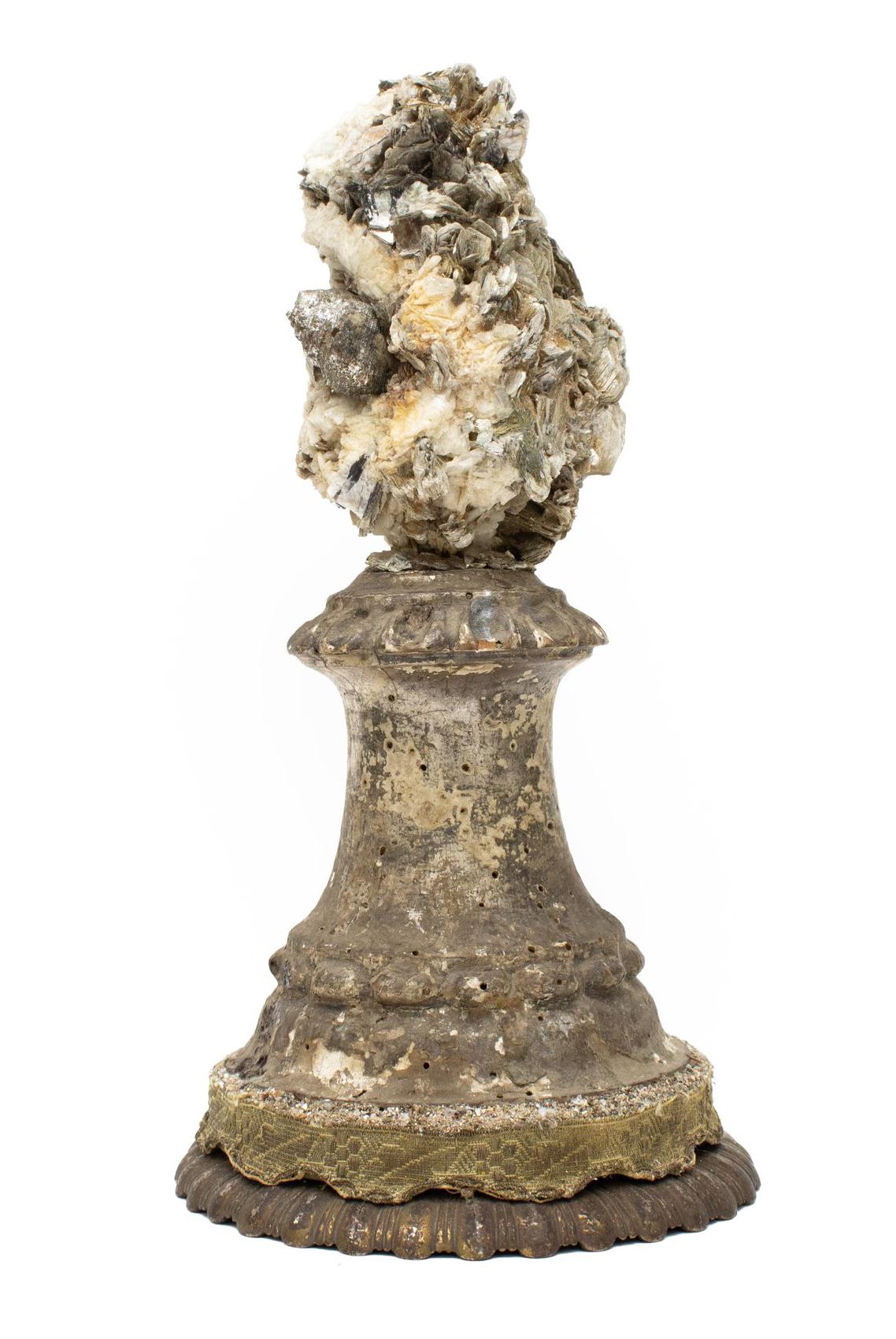 Sculptural 18th century Italian base decorated with mica in matrix, and silver leaf shells on an antique metal base decorated with church vestment braid. The 18th century fragment base and vestment braid originally came from a historical Italian