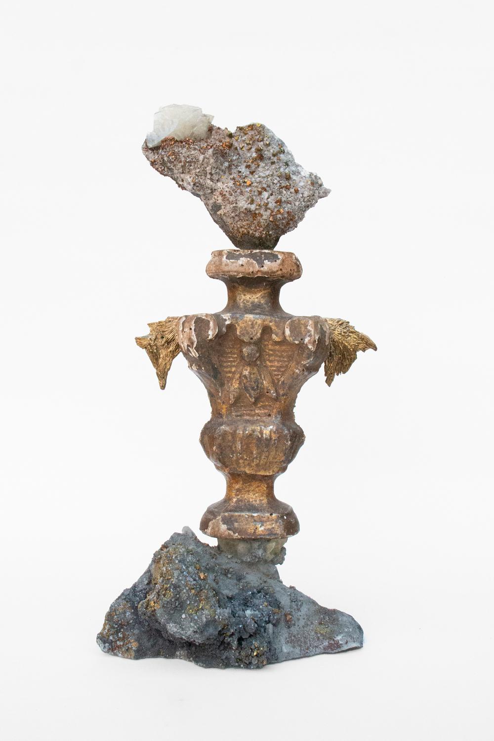 Sculptural 18th century Italian fragment with chalcopyrite on a druzy crystal matrix with calcite crystals and gold-plate kyanite.

This fragment was originally part of a candlestick from a church in Italy. It is distressed from time but still has