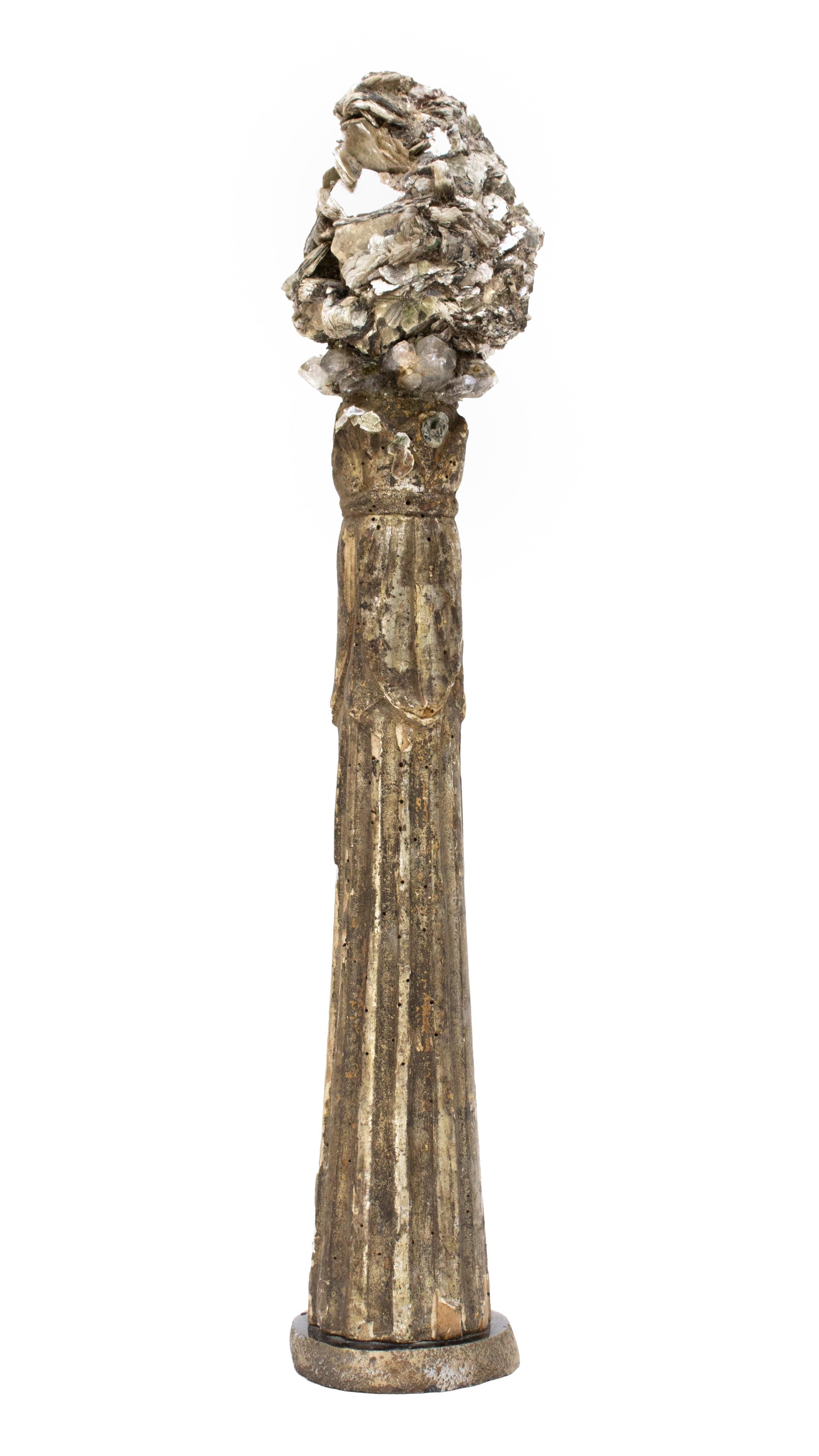 Sculptural 18th century Italian fragment decorated with mica and crystal quartz points on a polished agate base. The 18th century fragment originally came from a candlestick in a historical church in Italy.

The piece is put together by Jean