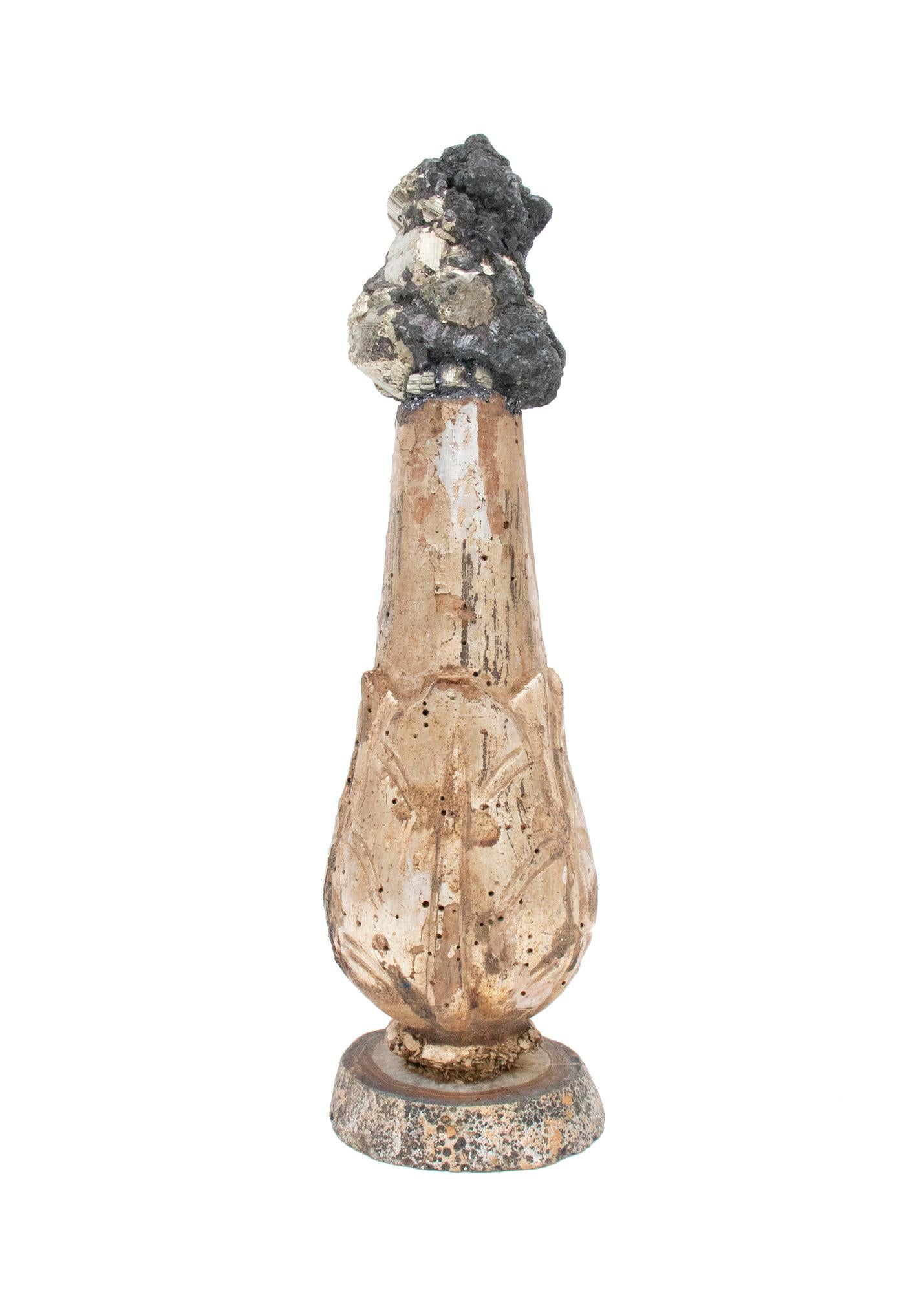 18th-century Italian gilded candlestick fragment with pyrite in matrix on a polished agate base.

The fragment was originally part of a candlestick in a historical Italian church in Italy. It is gilded and mounted with coordinating pyrite in matrix