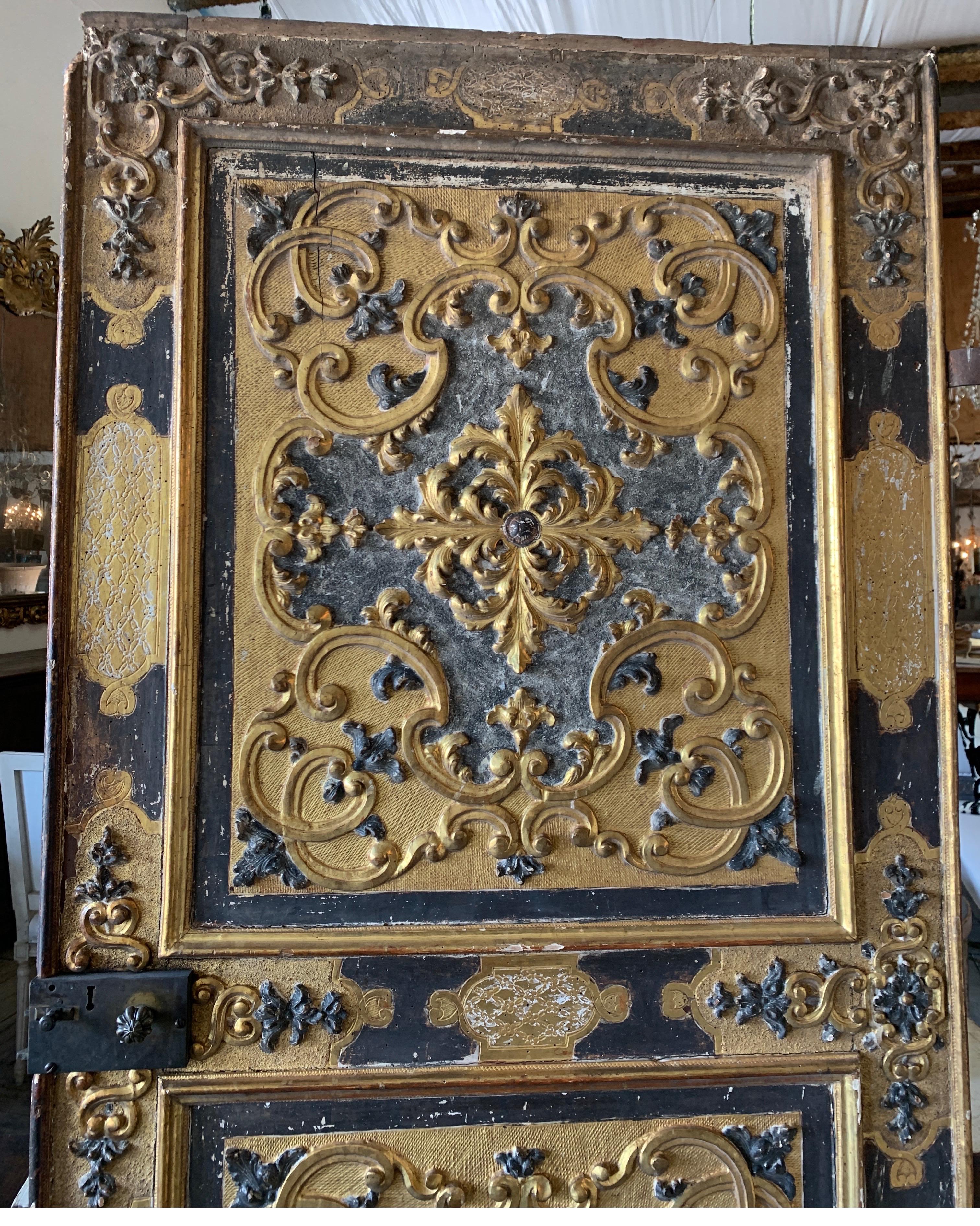 This beautiful door originated from the Torino region of Piedmont in Italy. It comes from a Villa and is a wonderful statement piece for your room. It’s gilt is original and all the hardware as well. There is one side at the bottom where the trim is