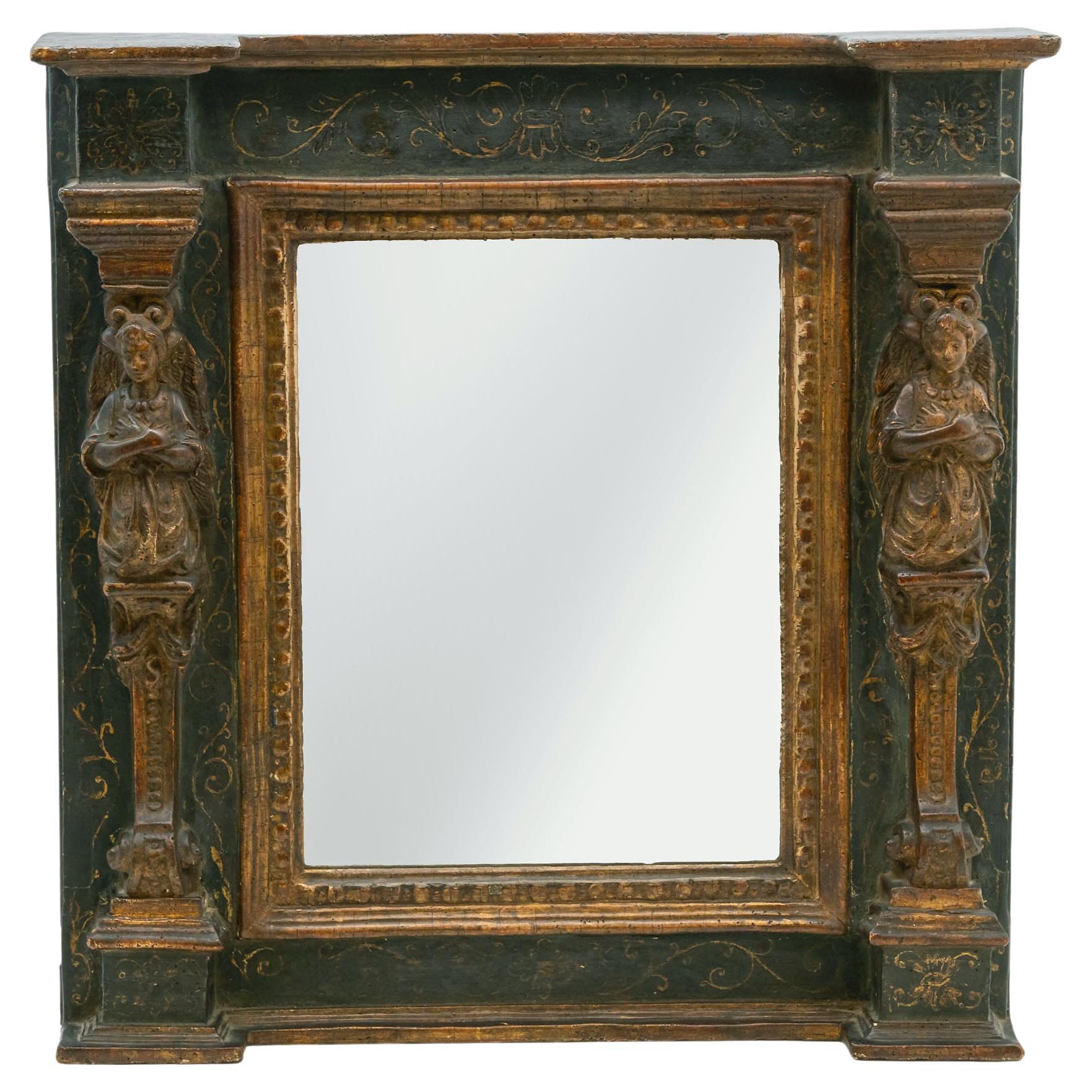 Espejo de pared italiano del siglo XVIII de madera dorada y columnas laterales de cariátides pintadas en venta