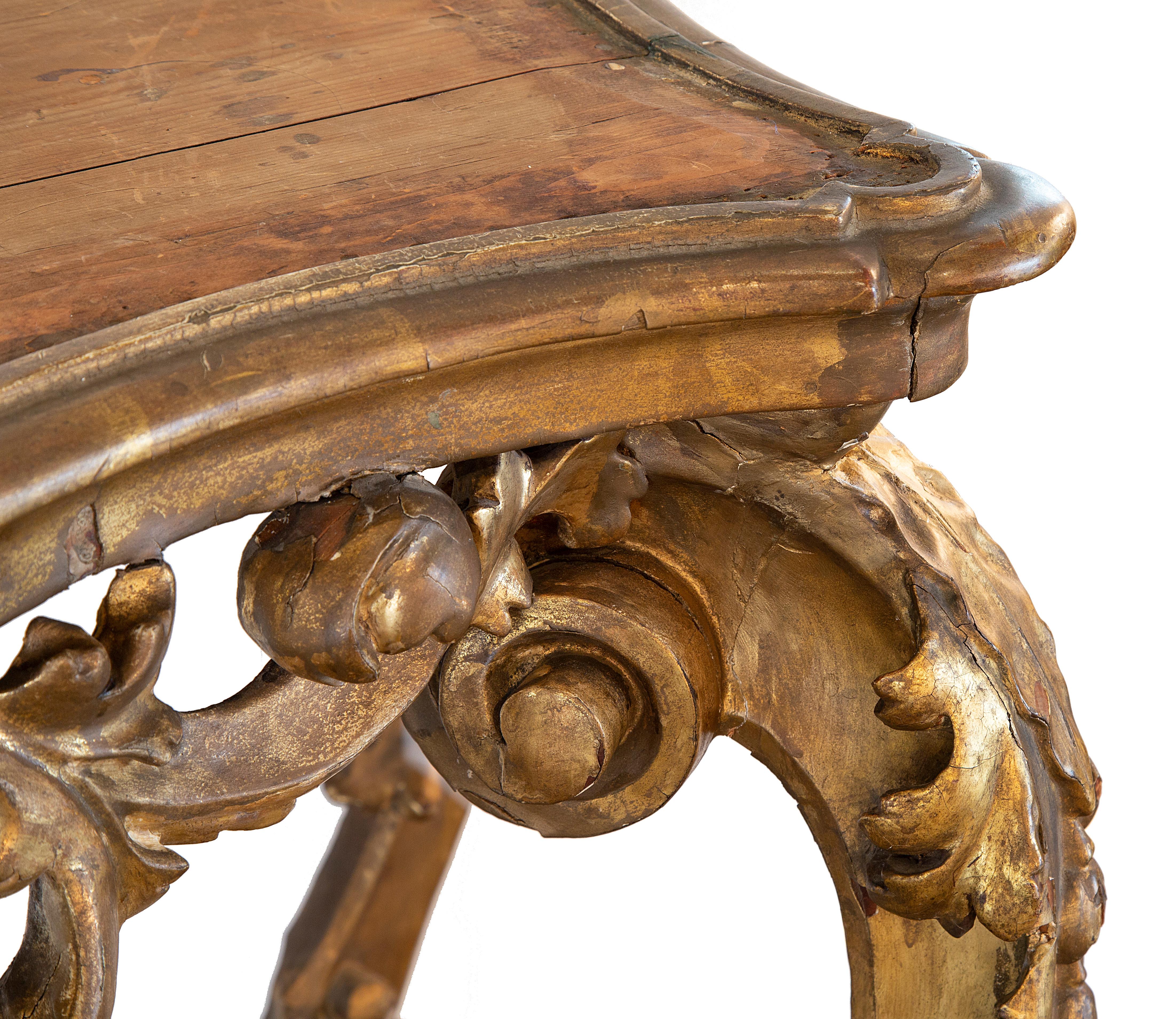 18th century Italian giltwood console; finely carved with original surface. Console top was likely leather or canvas originally.