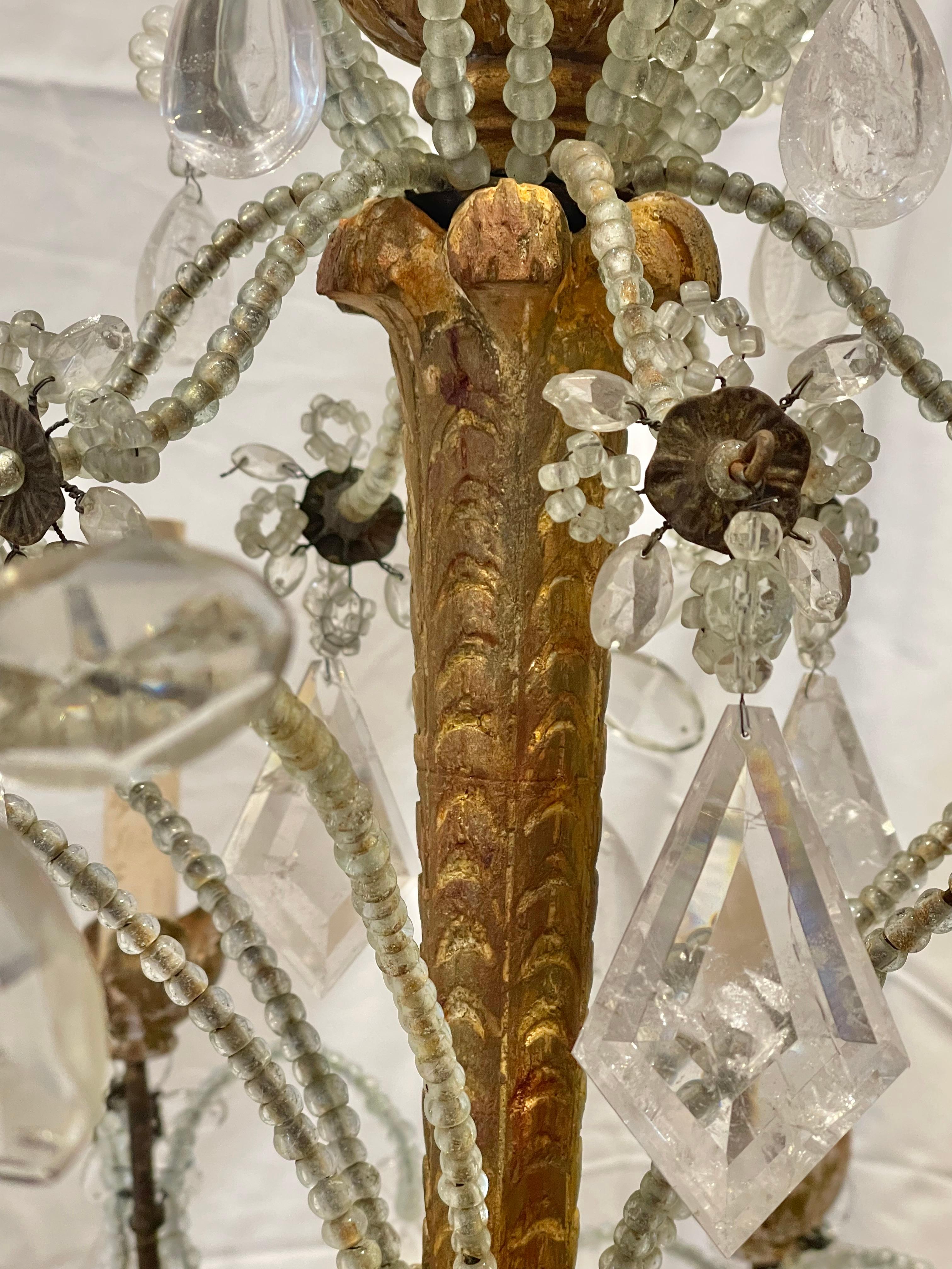 Cristal de roche Lustre à douze lumières en bois doré, métal et cristal de roche italien du XVIIIe siècle en vente