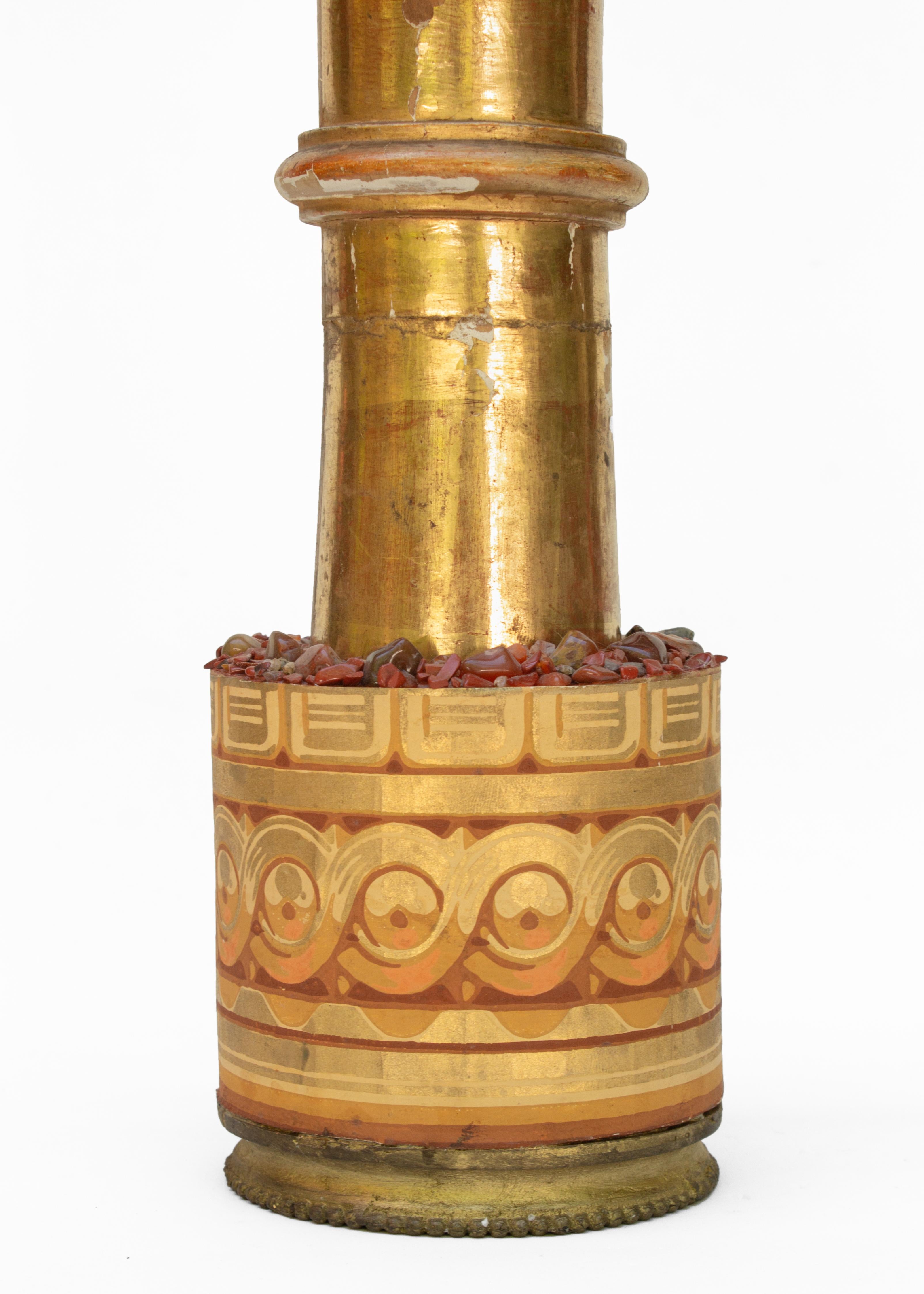 18th century Italian gold leaf wood candlestick with a coordinating antique wallpaper base decorated with polished jasper stones. The gold leaf candlestick originates from a large church in Florence and sits on a brass metal base. The number on the