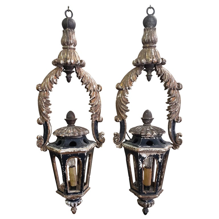 Pair of Italian gold leaf and black lanterns, 18th century, offered by Tara Shaw Ltd.