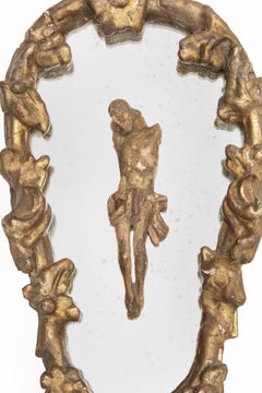 18th Century Italian Gold Leaf Distressed Mirror with Carved Figure of Christ