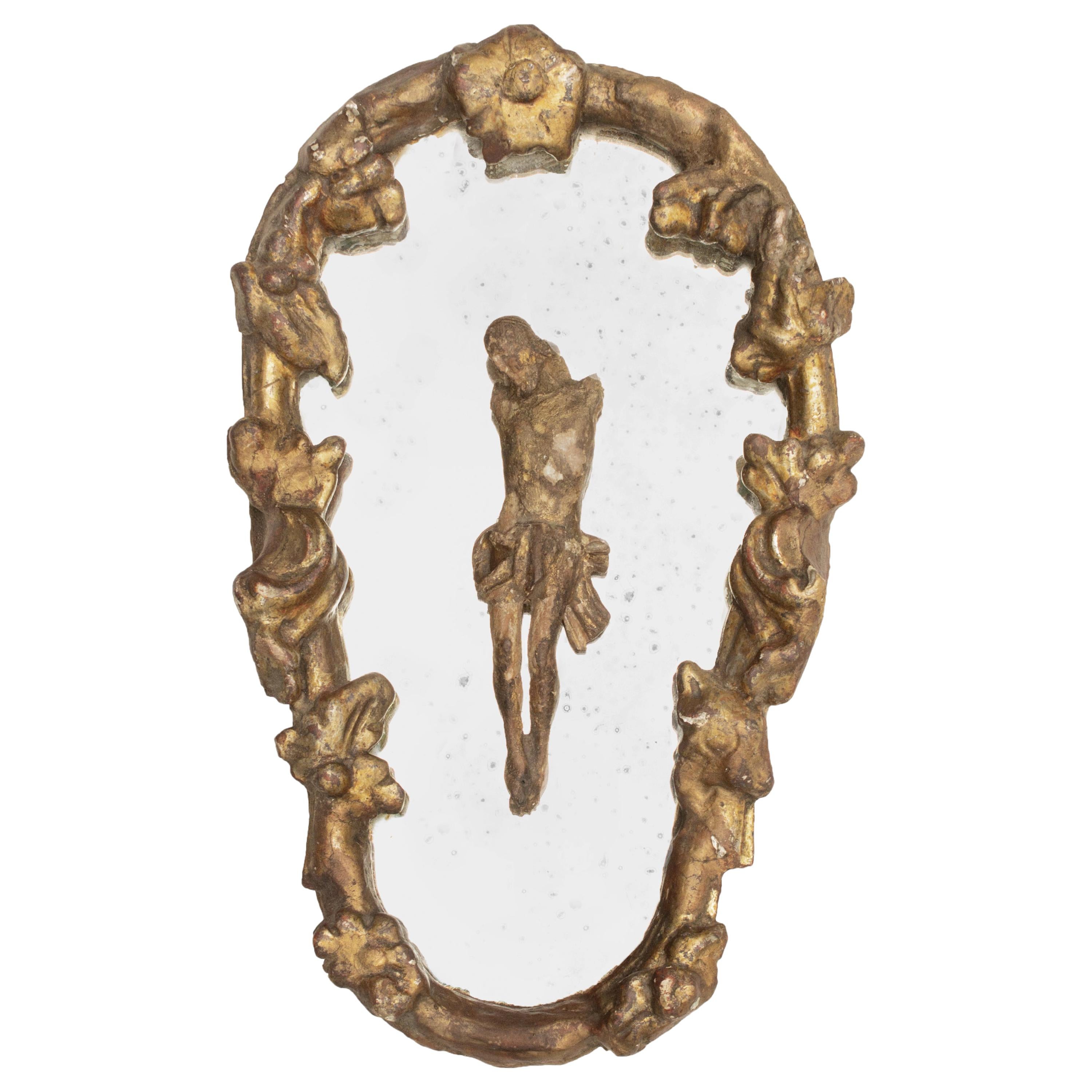 18th Century Italian Gold Leaf Distressed Mirror with Carved Figure of Christ
