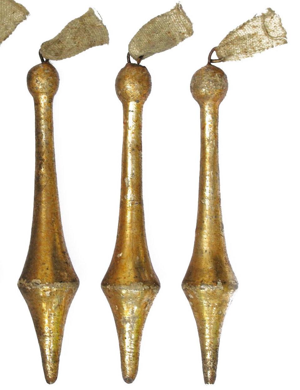 18th century Italian gold leaf tassel ornaments.

The tassels originally came from an 18th century Italian chandelier. They are hand-carved and hand-painted. Can be configured into holiday ornaments and decorations to recreate a Rococo-style
