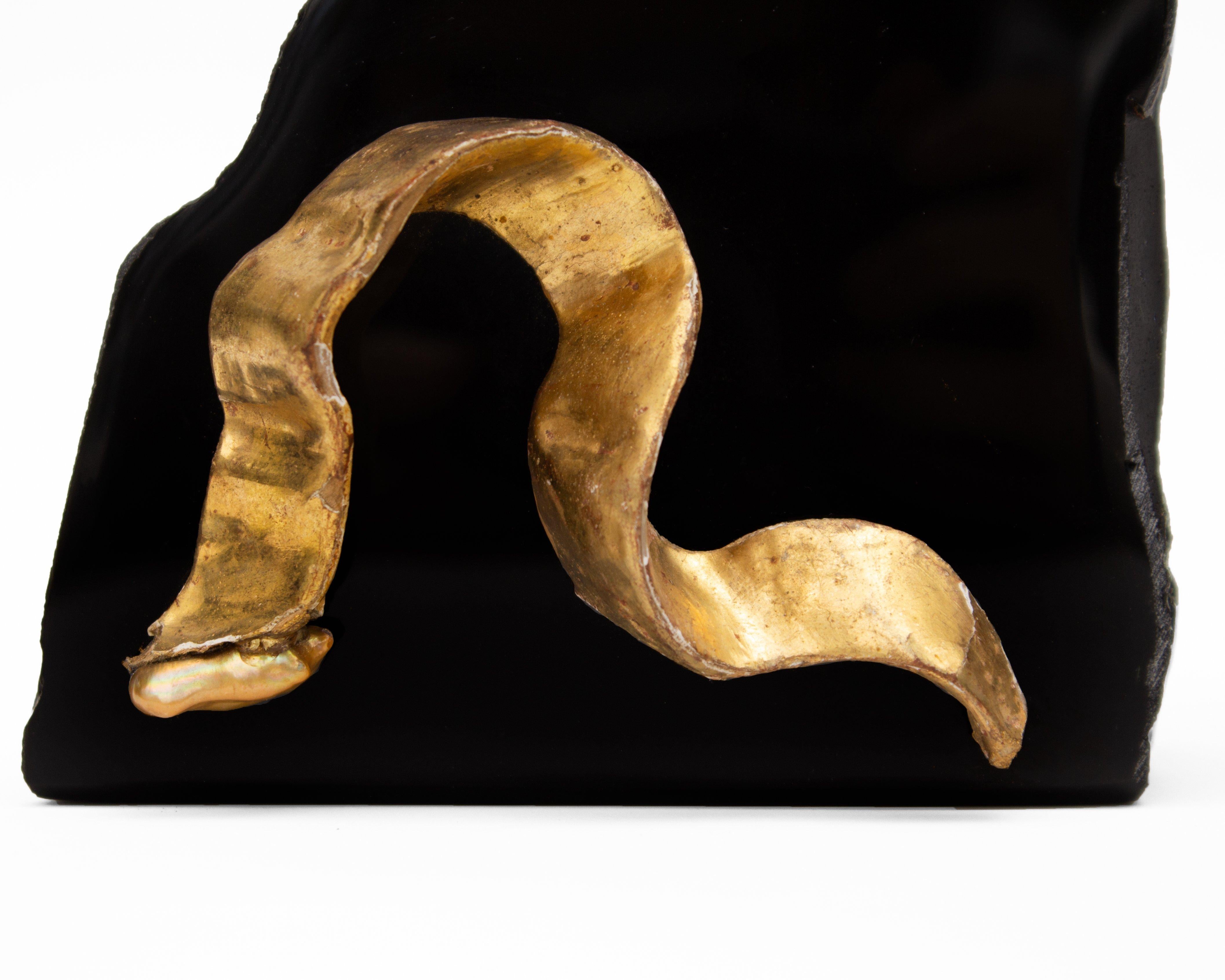 Modern 18th Century Italian Gold Ribbon Fragment with a Baroque Pearl on Obsidian For Sale