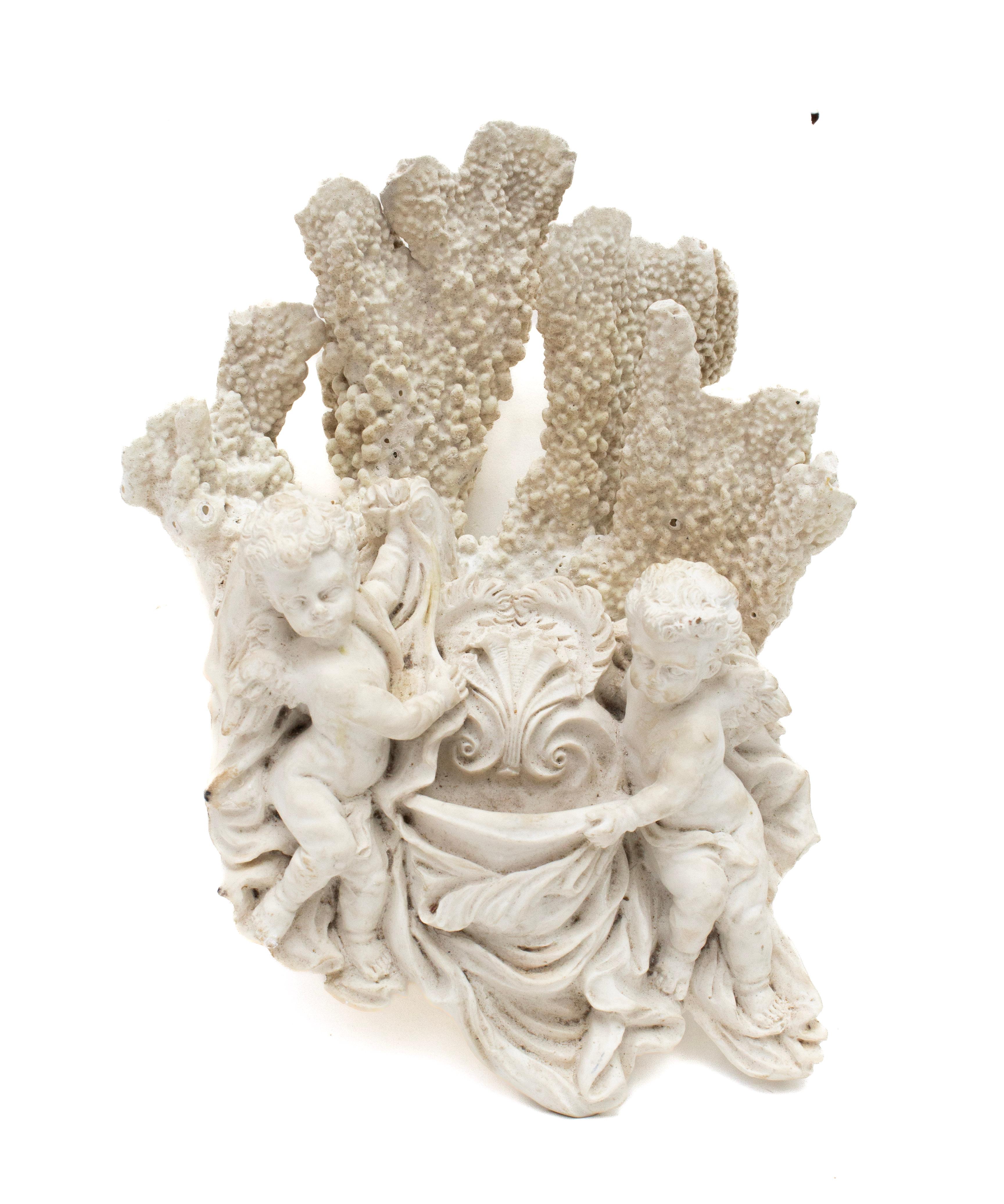 18th century Italian holy water font with two angels framed with polished agate coral wings on fossil coral. 

The Italian holy water front is from a historical Italian church and is made from gesso and marble dust. It is framed with the fossil