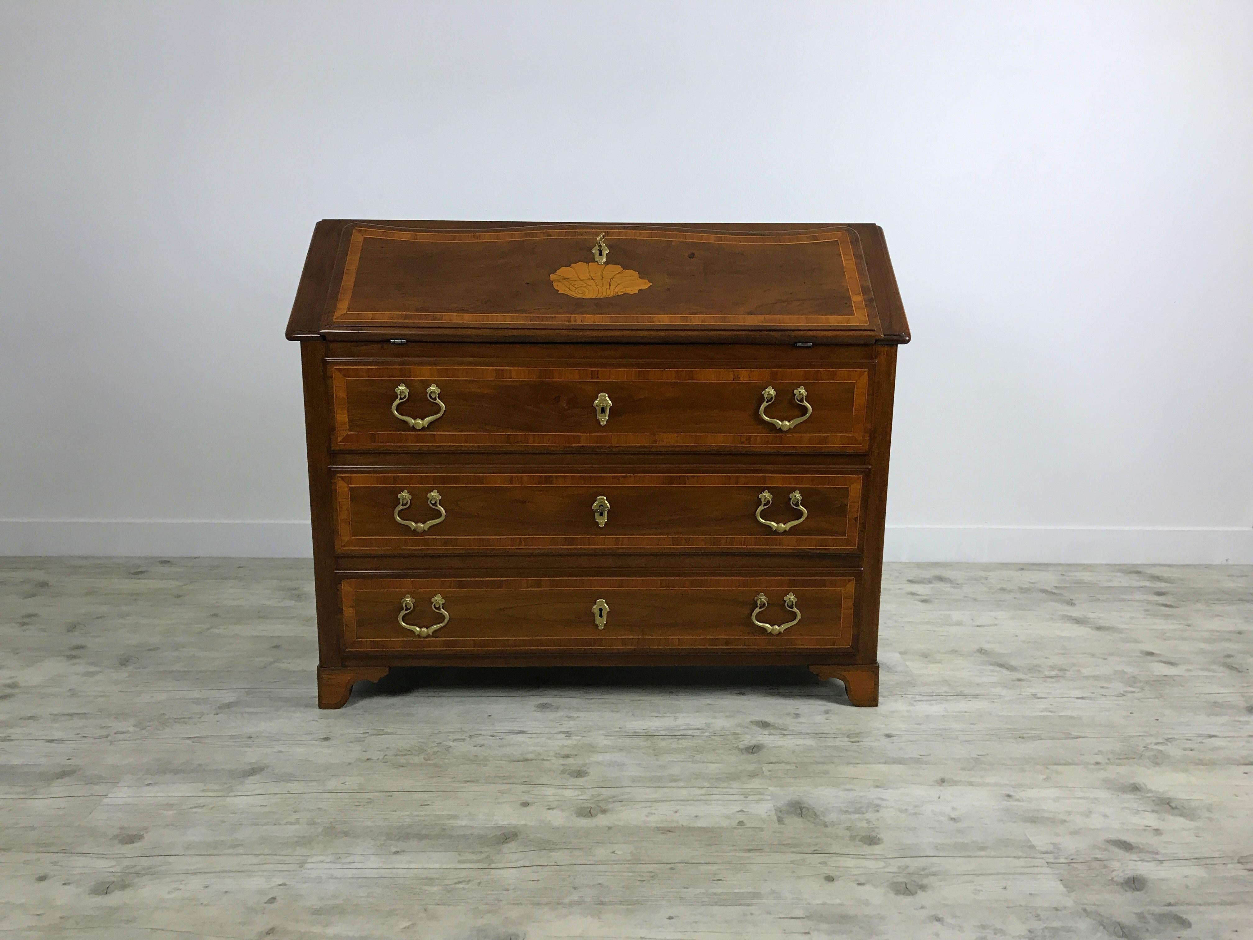 18th century, Italian inlaid and solid walnut wood chest of drawers with secretaire

This chest of drawers with secretaire was made in the north of Italy (Piedmont) around the middle of the 18th century. The cabinet is made of solid walnut wood