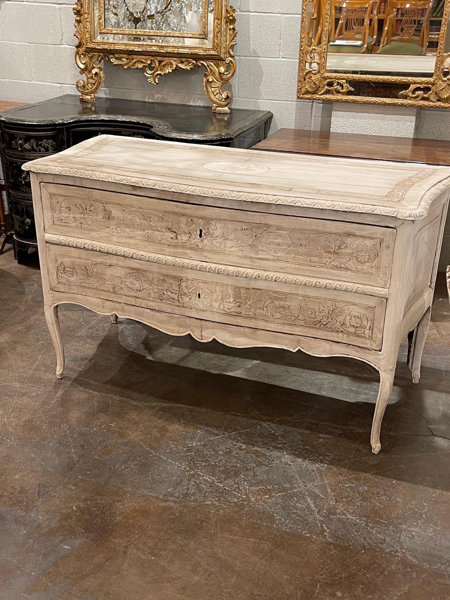 Very fine 18th century Italian inlaid bleached commode. This lovely piece has neoclassical images and nice carvings as well. Beautiful!