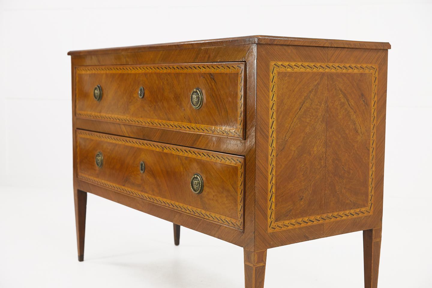 18th century Italian inlaid two-drawer commode. Very stylish inlaid pattern giving it a contemporary feel.