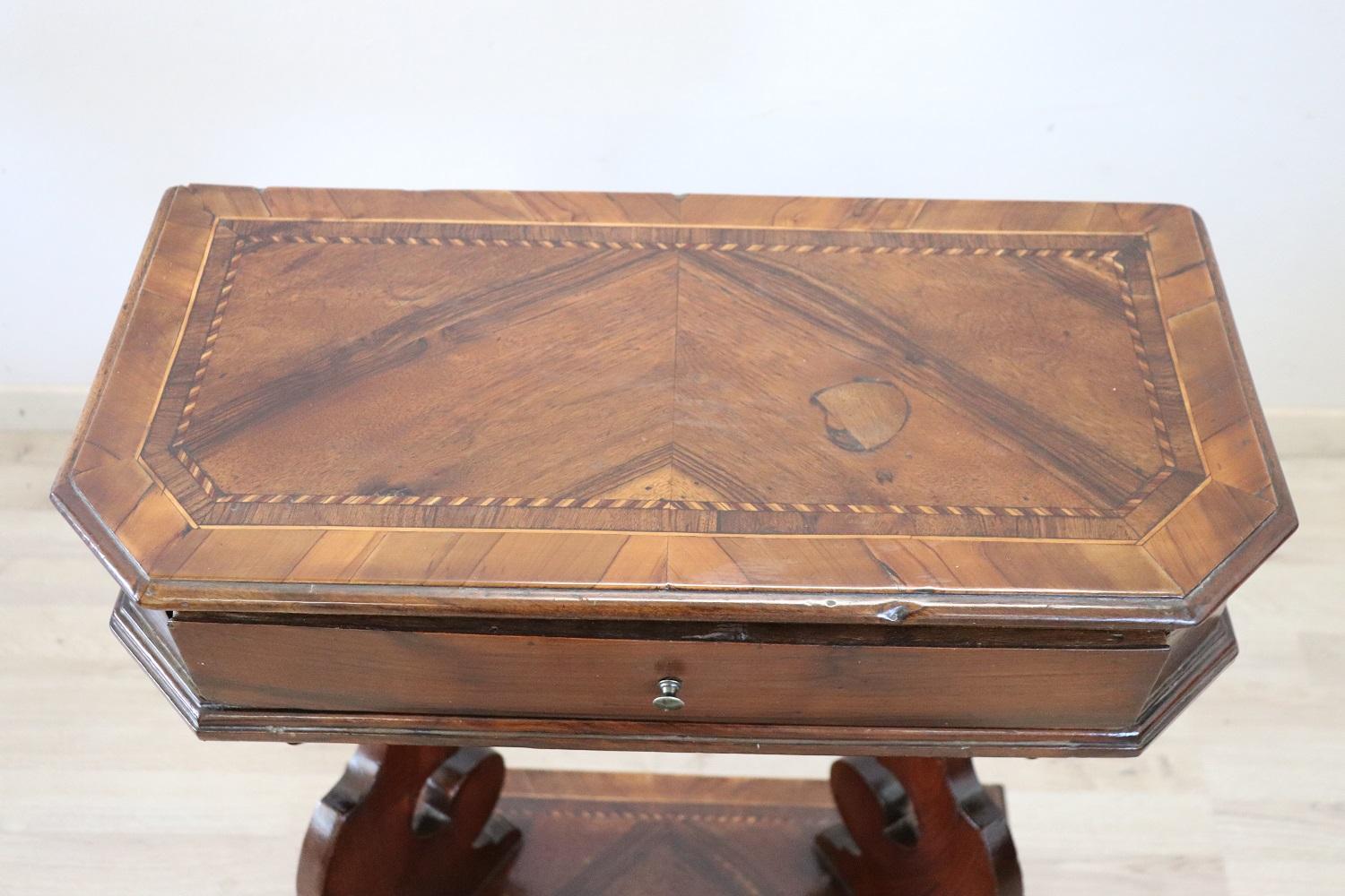 Rare antique Italian kneeler, 1780s.V ery refined made of walnut wood with small geometric inlaid decorations. Equipped with two practical drawers. Place this elegant antique Arma Christi prayer chair in your bedroom for daily devotions.