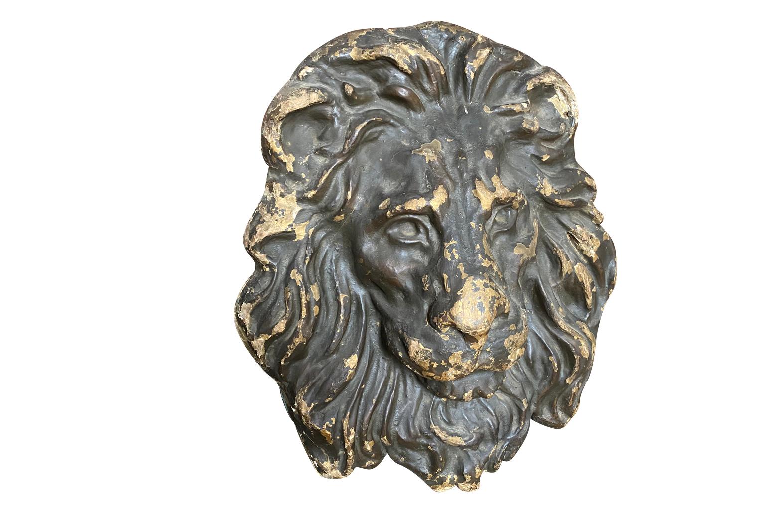 An outstanding 18th century lion head Blason, crest expertly crafted from wood and Papier Mache. This exceptional piece origins from the Lucca region. Super patina. A fabulous art piece for any interior.