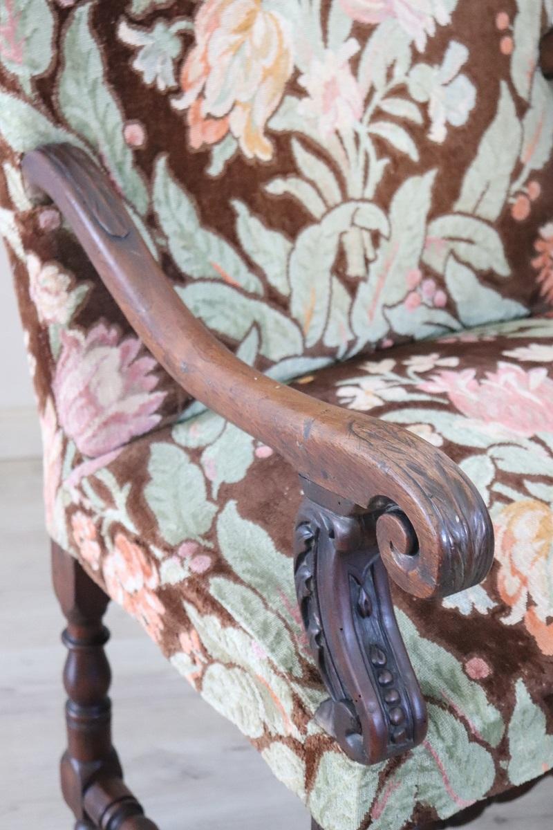 We offer you this majestic antique armchair dating back to the first decades of the 18th century during the Louis XIV period.

The armchair is characterized by a throne line with a solid walnut structure, comfortable backrest and seat with padding.