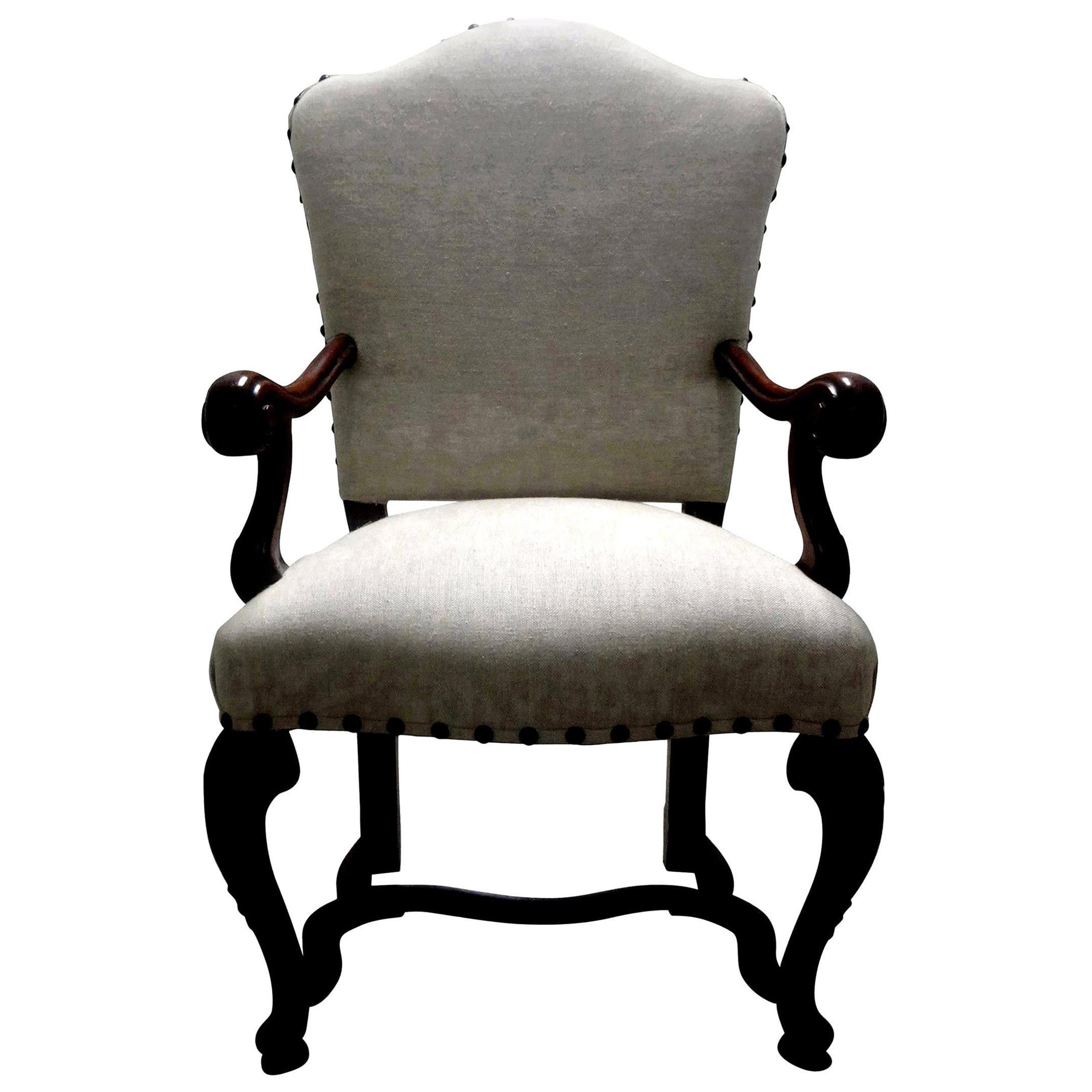 18th century Italian Louis XIV walnut chair.
Handsome 18th century northern Italian Louis XIV walnut chair. Our beautiful antique Italian walnut armchair was taken down to the frame and professionally upholstered in oatmeal colored linen with