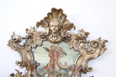 Grand miroir mural italien d'époque Louis XV du 18ème siècle en bois sculpté et doré