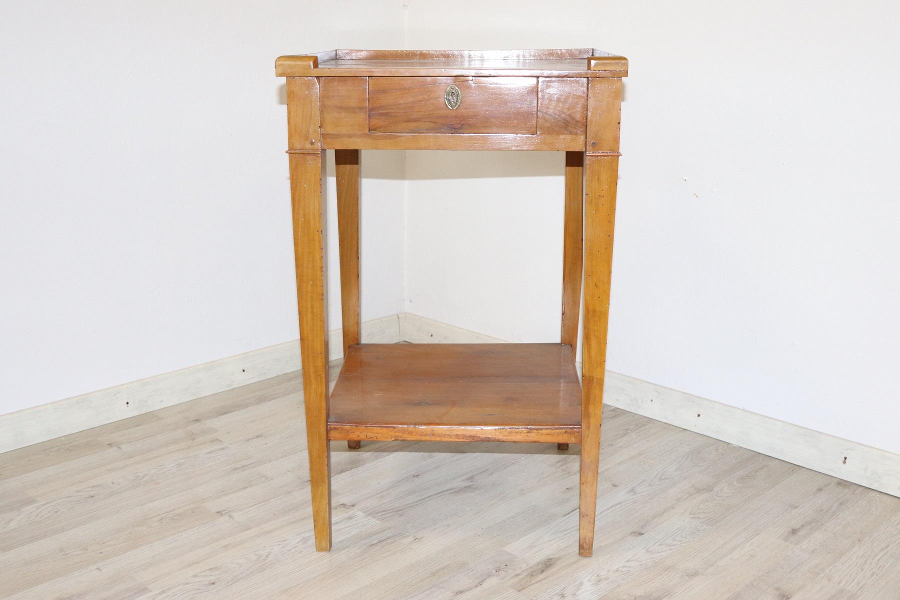Particular Italian Louis XVI 18th century antique side table characterized by linear legs, two comfortable drawers. cherrywood very elegant light shade. Still present some nails of the 18th century.
For its small ideal size in every room of the