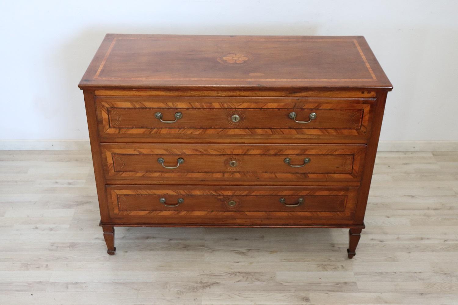 Important antique Italian Louis XVI chest of drawers 1780s walnut wood. Inlaid decoration of geometric taste. On the front three large and useful drawers. In the 17th century only important families could afford to have furniture of this value. This
