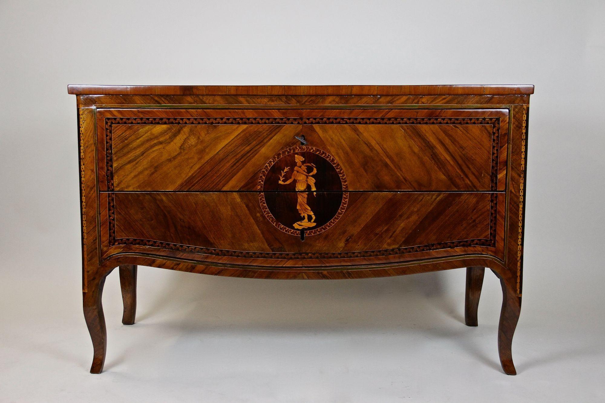An absolute masterpiece of mid 18th century Italian craftsmanship is this unbelievable artfully crafted marquetry chest of drawers out of Milan. Made around 1760 with highest attention to details, this one of a kind museum-quality commode is not