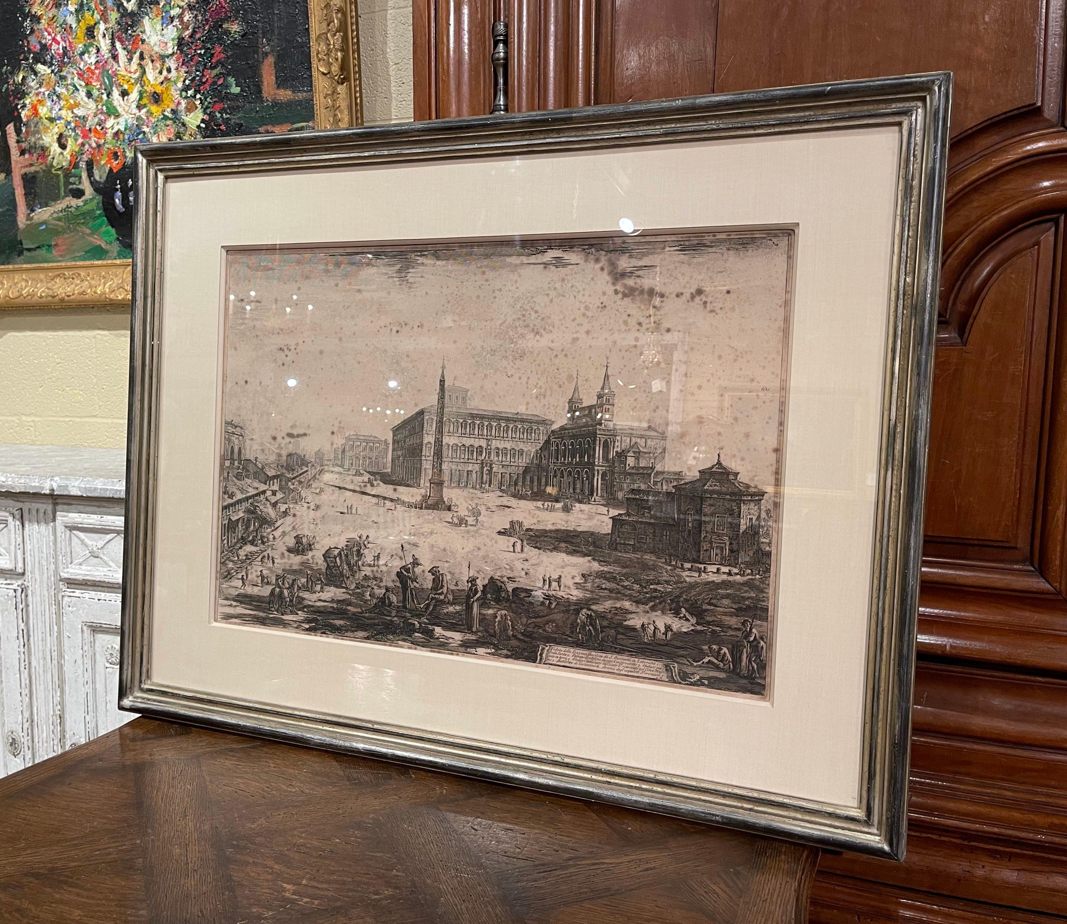 Decorate an office or study with this antique black and white engraving. Hand colored in Italy circa 1775, the large monochromatic etching is set in a silvered frame with protective glass, and depicts the Arch basilica of Saint John in Rome. The