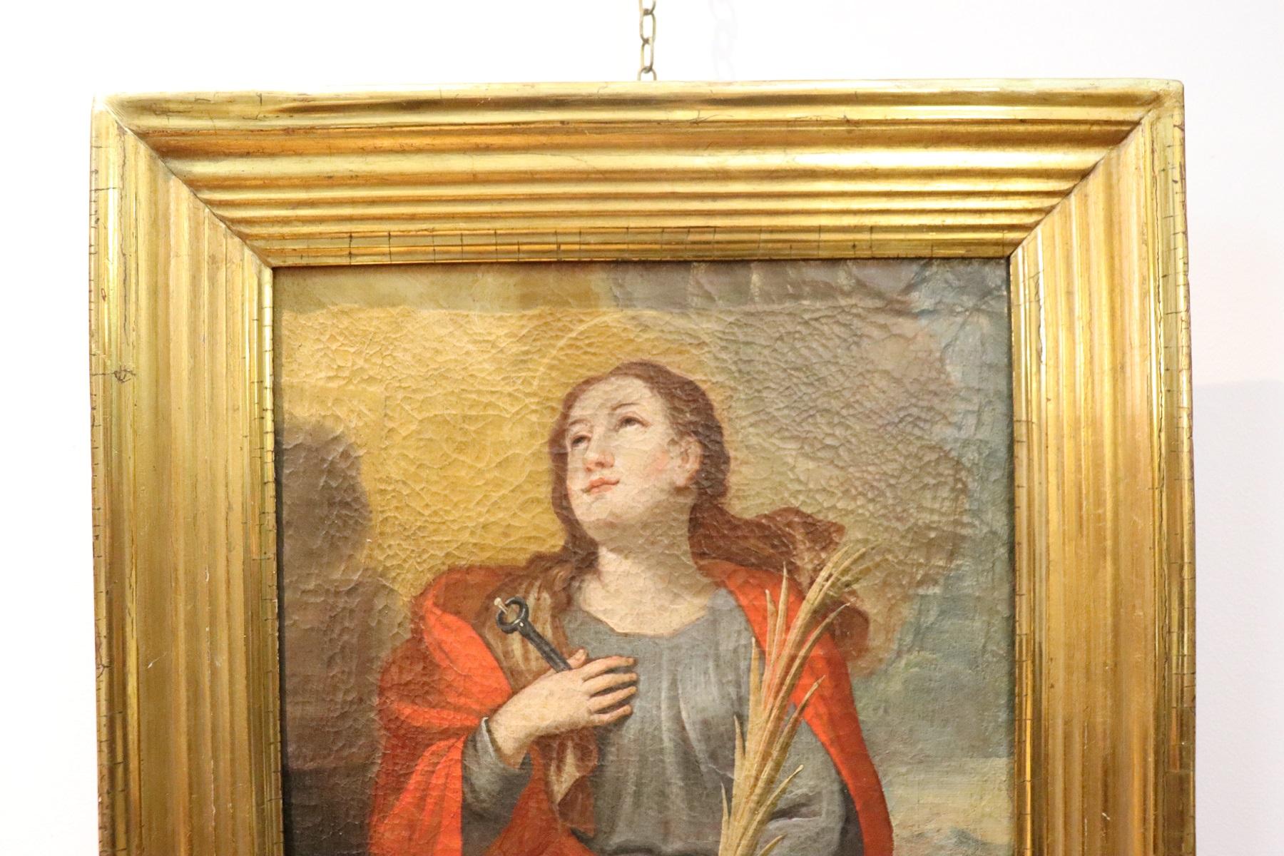 Refined oil painting on canvas from an important collection of Italian antique paintings about 1750s. Religious subject saint Apollonia depicted with the classical objects of iconography. Apollonia was a Christian martyr, venerated by the Catholic