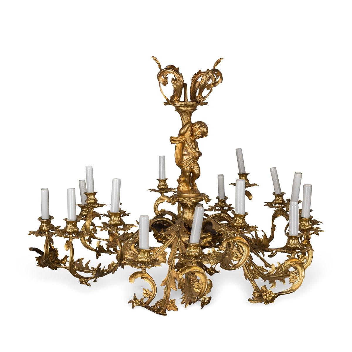 Antique 18th Century Italian ormolu chandelier in rococo style with putti stem ornaments. This chandelier is in superb condition, the foliate branch arms issuing from the putti has been converted to accomodate an electrical supply to the 15