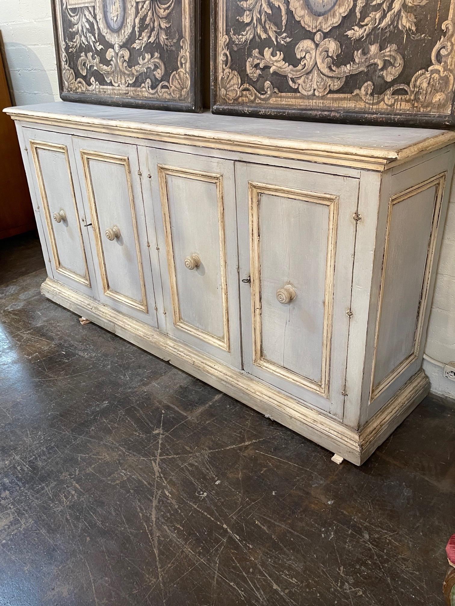 Beautiful 18th century Italian painted buffet from Tuscany. Nice pale grey color with a very nice patina. Great for the modern farmhouse look!
