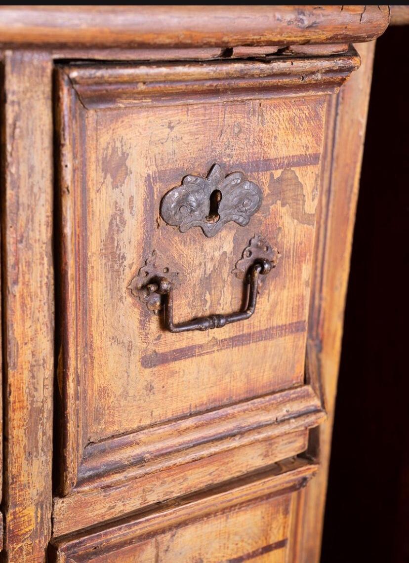 This wonderful 18th century long commode is extremely rare and I have never seen one like it.It is painted in the 18thc style using a combination of linseed oil,pigments and turpentine. Yellow ochre was used on this commode and is a natural mineral