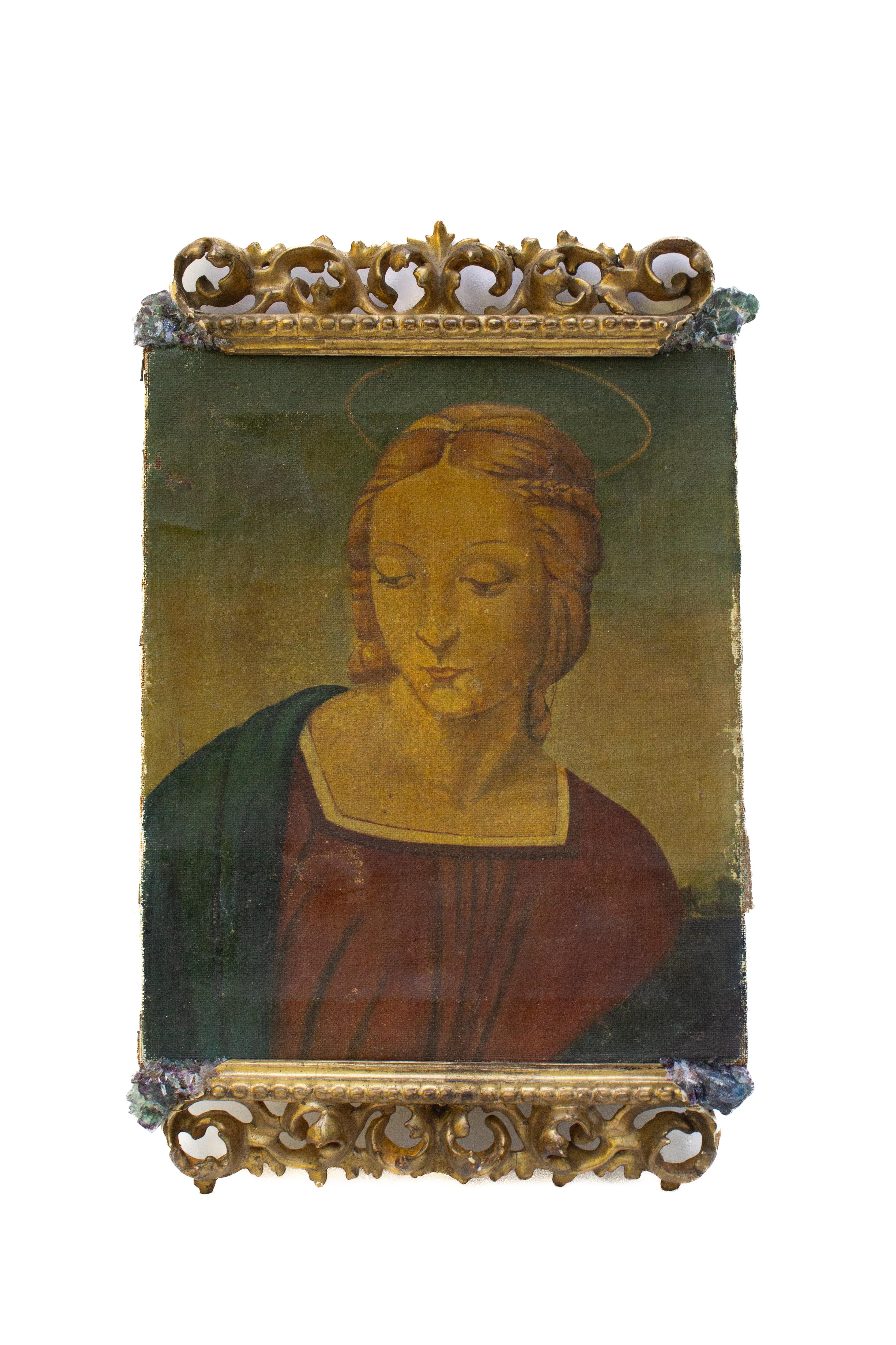18th century Italian painting of Mary adorned with an 18th century Italian gilded fragment frame and bejeweled with green and purple fluorite.

The painting depicts Mary or possibly another saint crowned with a halo. The painting originally came