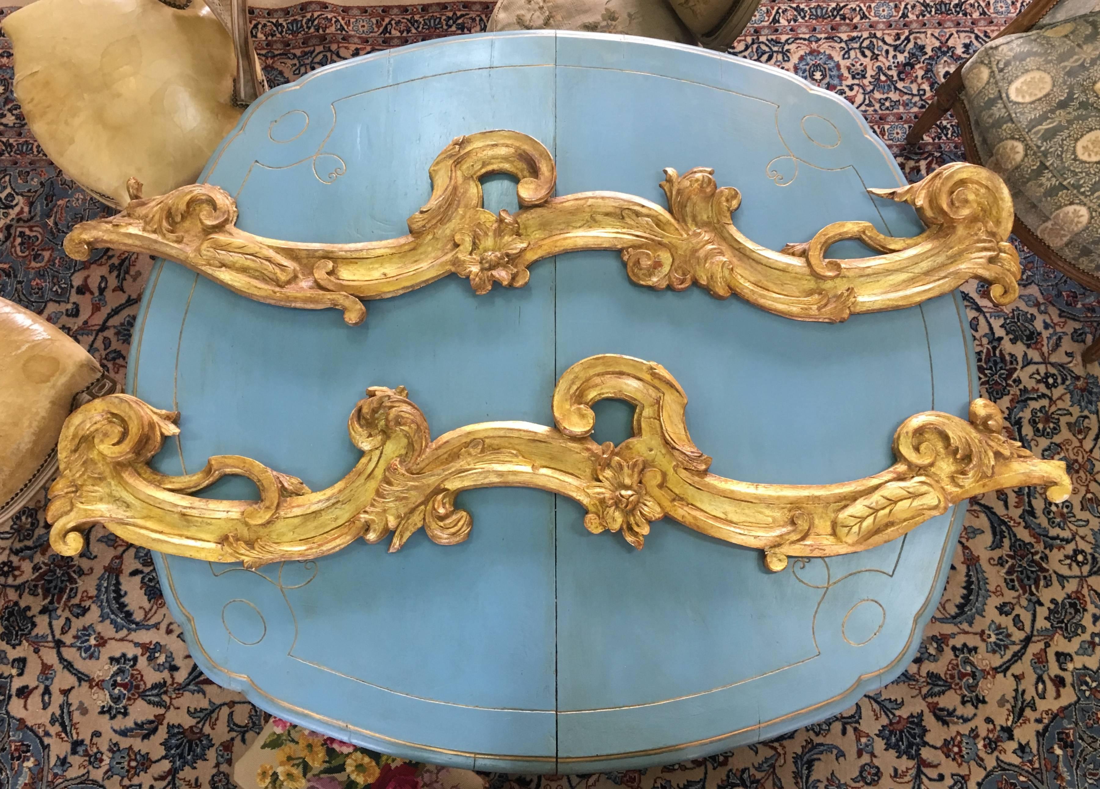 18th century pair of giltwood wall decoration from Italy.
Could be used as a top part of a grand frame or as a decoration over a doorway but it is actually up to your imagination to decide where to place this beautiful pieces,
circa 1780.