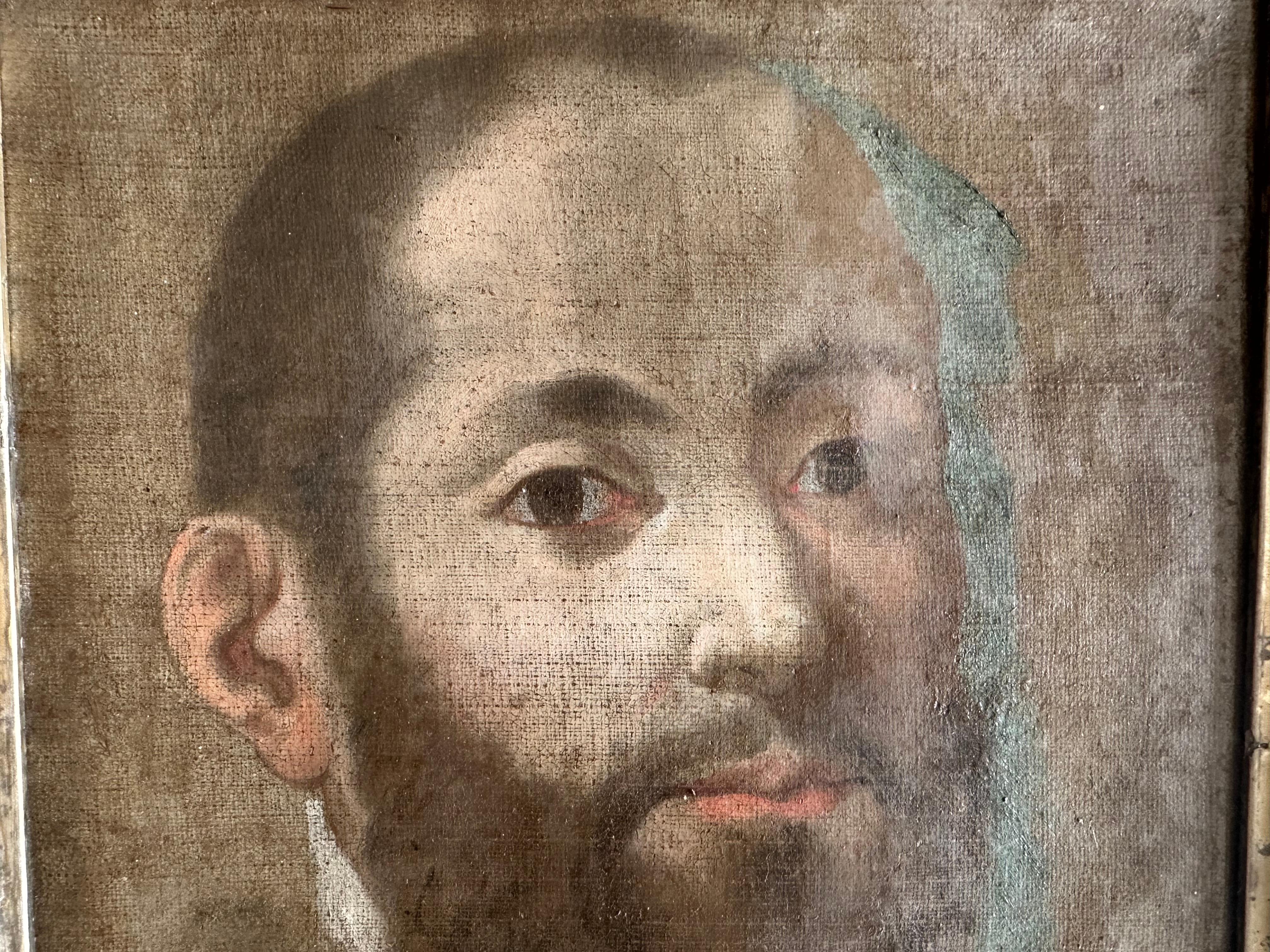 Ce portrait italien du XVIIIe siècle représente un homme distingué dans un style vaguement esquissé et légèrement brumeux, ce qui confère à la peinture une qualité douce et atmosphérique. Bien qu'elle ne soit pas signée, elle dégage le charme et le