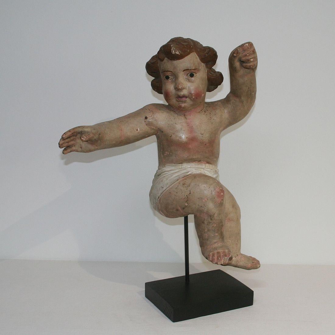 Beautiful Primitive Baroque angel, Italy, 18th century. Weathered, small losses. Measurement with the base.