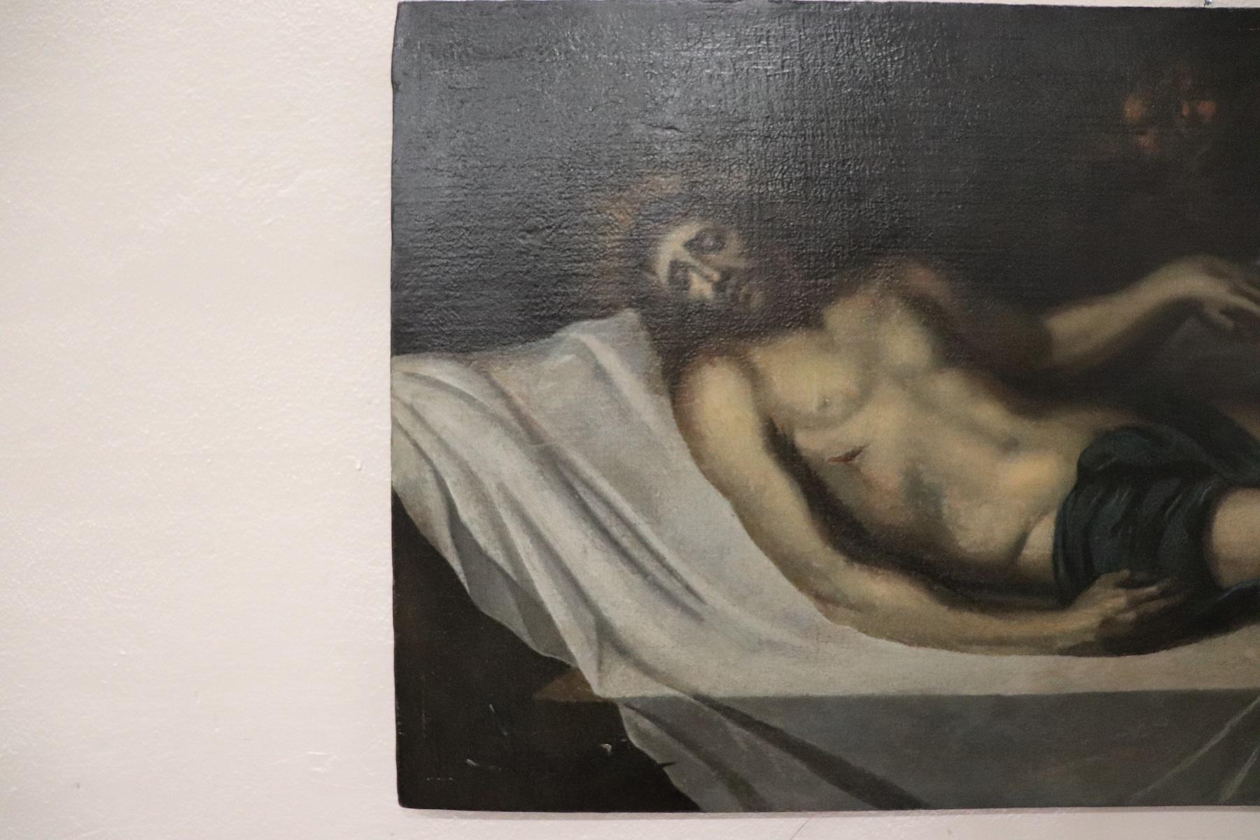 Important antique painting oil on canvas 18th century coming from an important collection of ancient paintings. It is a very recurring subject in religious painting, Christ laid down after death on the cross. The work is of high artistic quality.