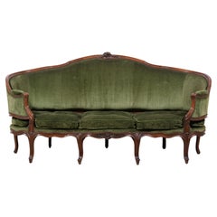 18. Jahrhundert, Italienisches Rokoko Corbeille-Sofa aus geschnitztem Nussbaumholz