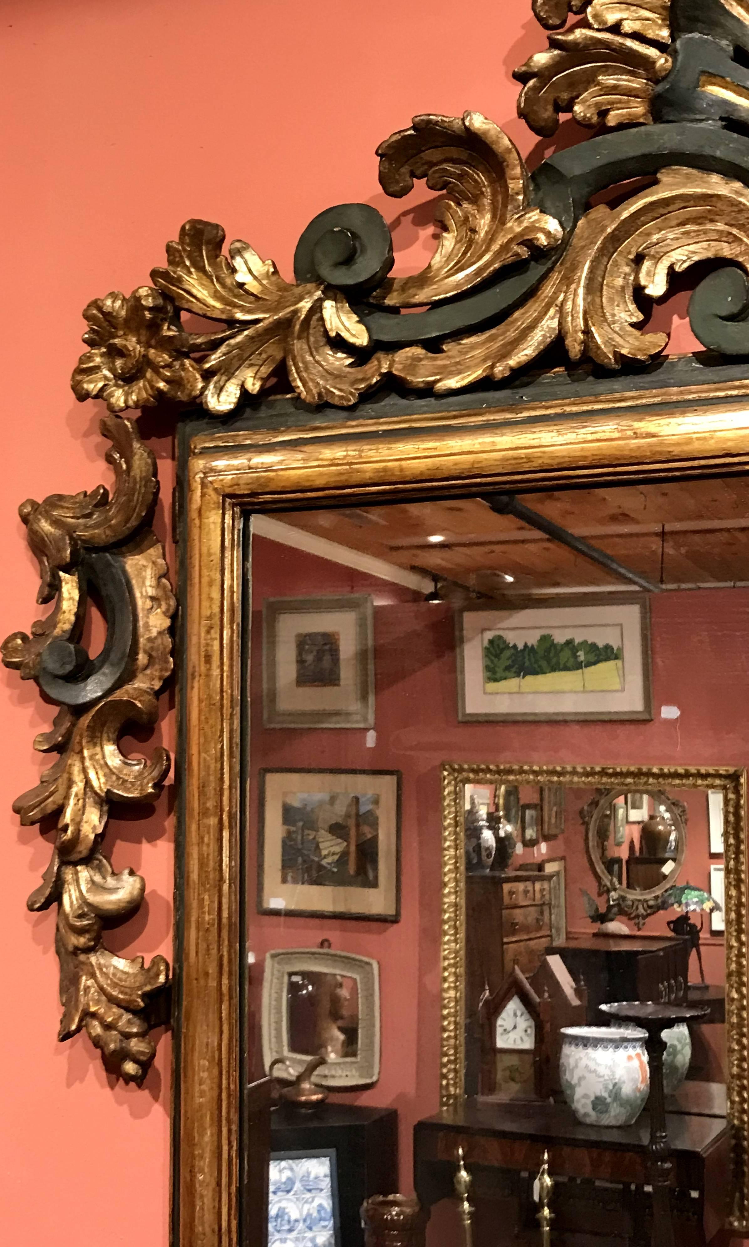 18th Century Italian Rococo Gilt Mirror with Exceptional Carved Crest In Excellent Condition In Milford, NH