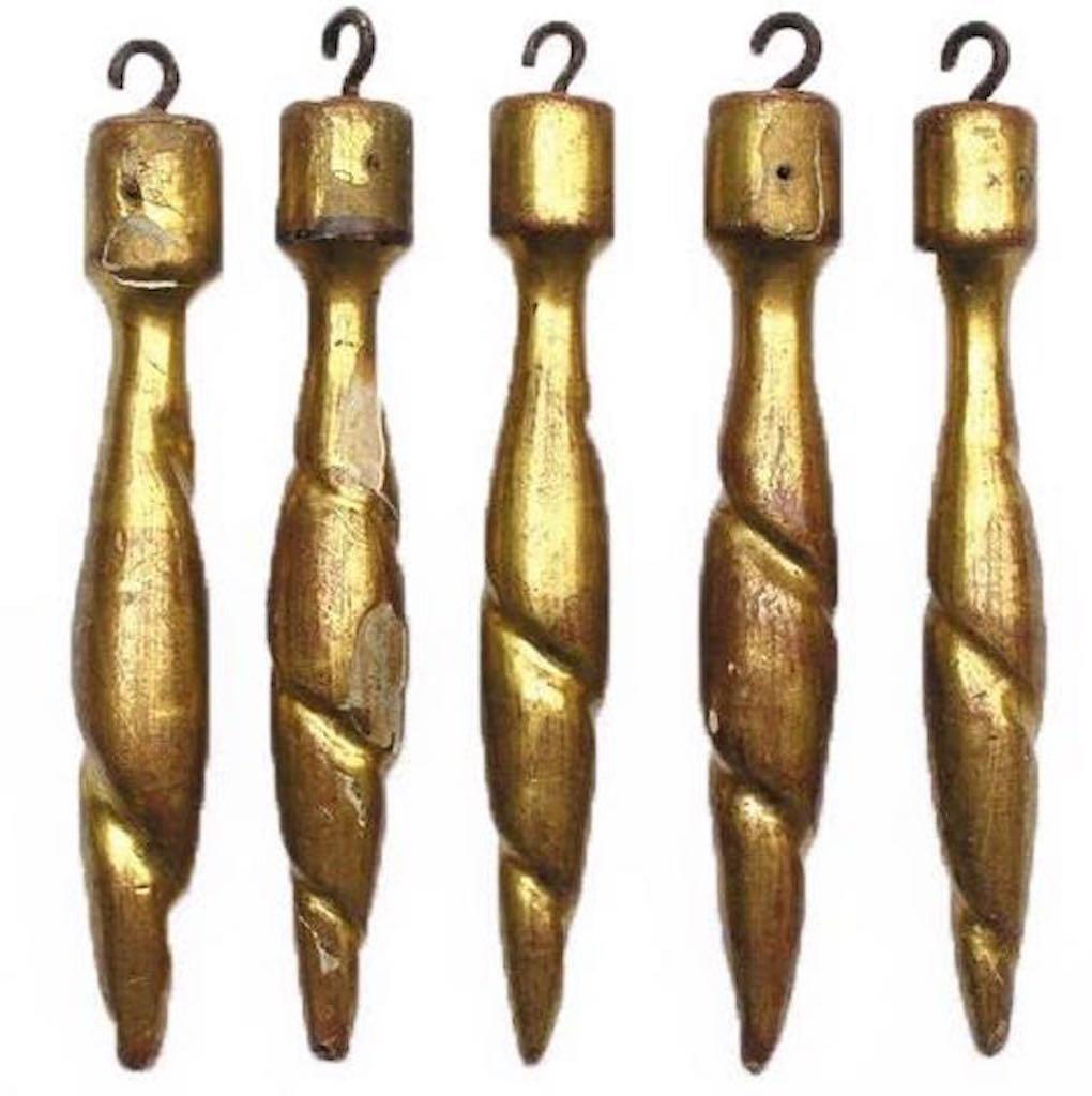 18th century Italian hand-carved gold leaf tassel ornaments.

The tassels originally came from an Italian church in Tuscany and were used during feast days. These tassels were commonly used to adorn 18th and 19th century French and Italian
