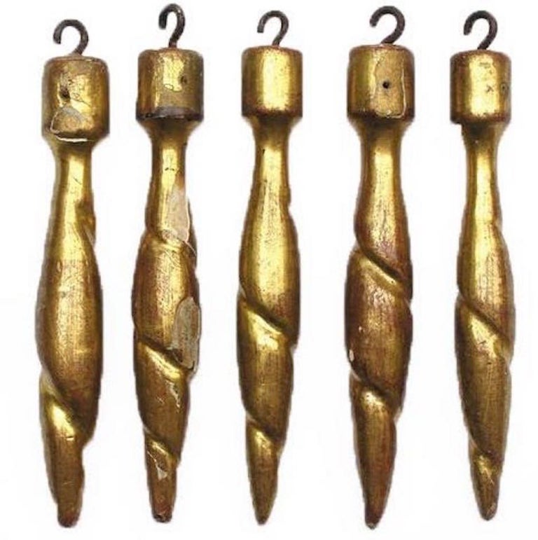 18th century Italian hand-carved gold leaf tassel ornaments

The tassels originally came from an Italian church in Tuscany and were used during feast days. These tassels were commonly used to adorn 18th and 19th century French and Italian