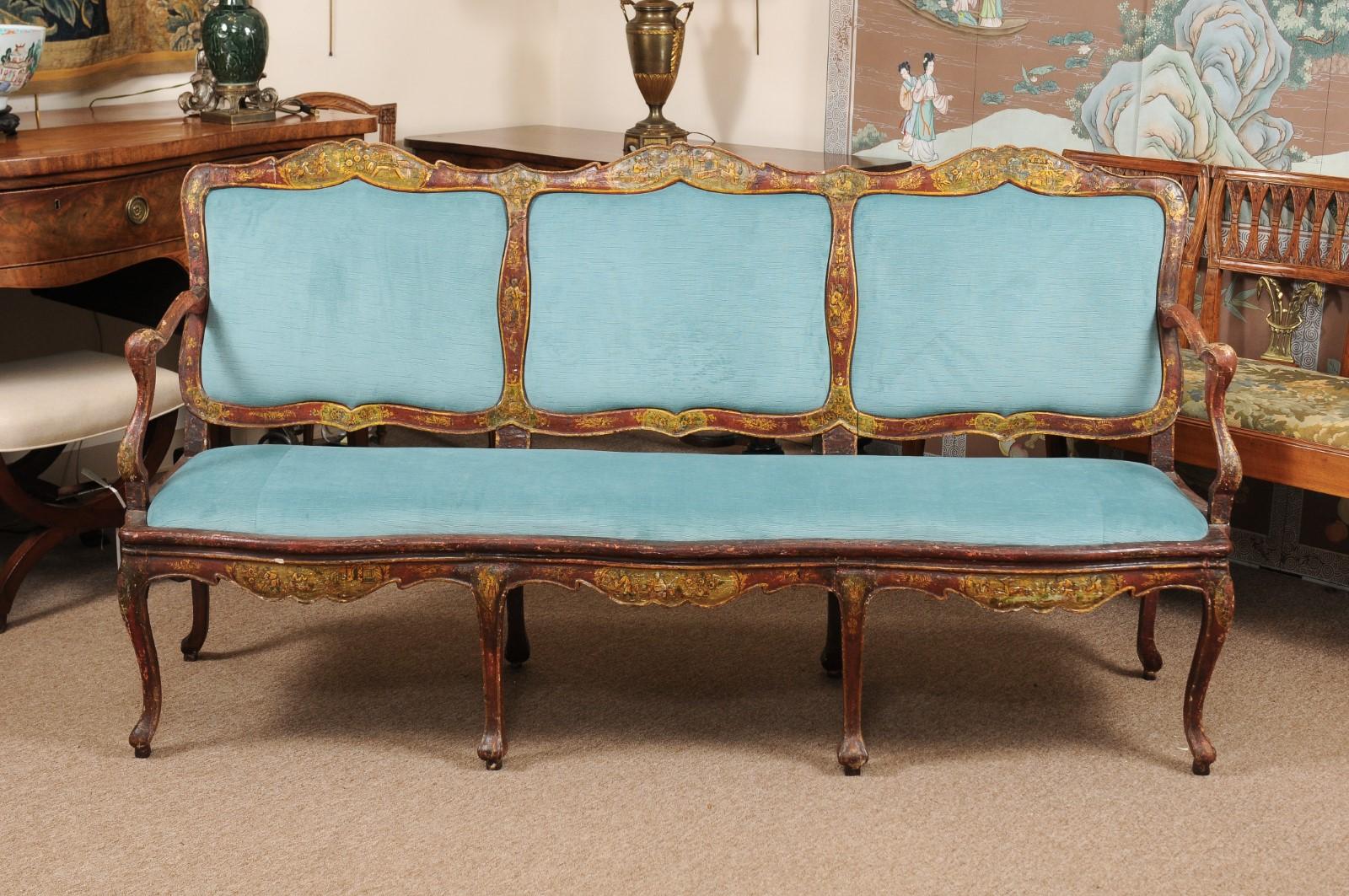 Chinoiserie painted triple back canape in hues of red, gold, and turquoise with removable upholstered seat and back panels, 18th century, Italy.