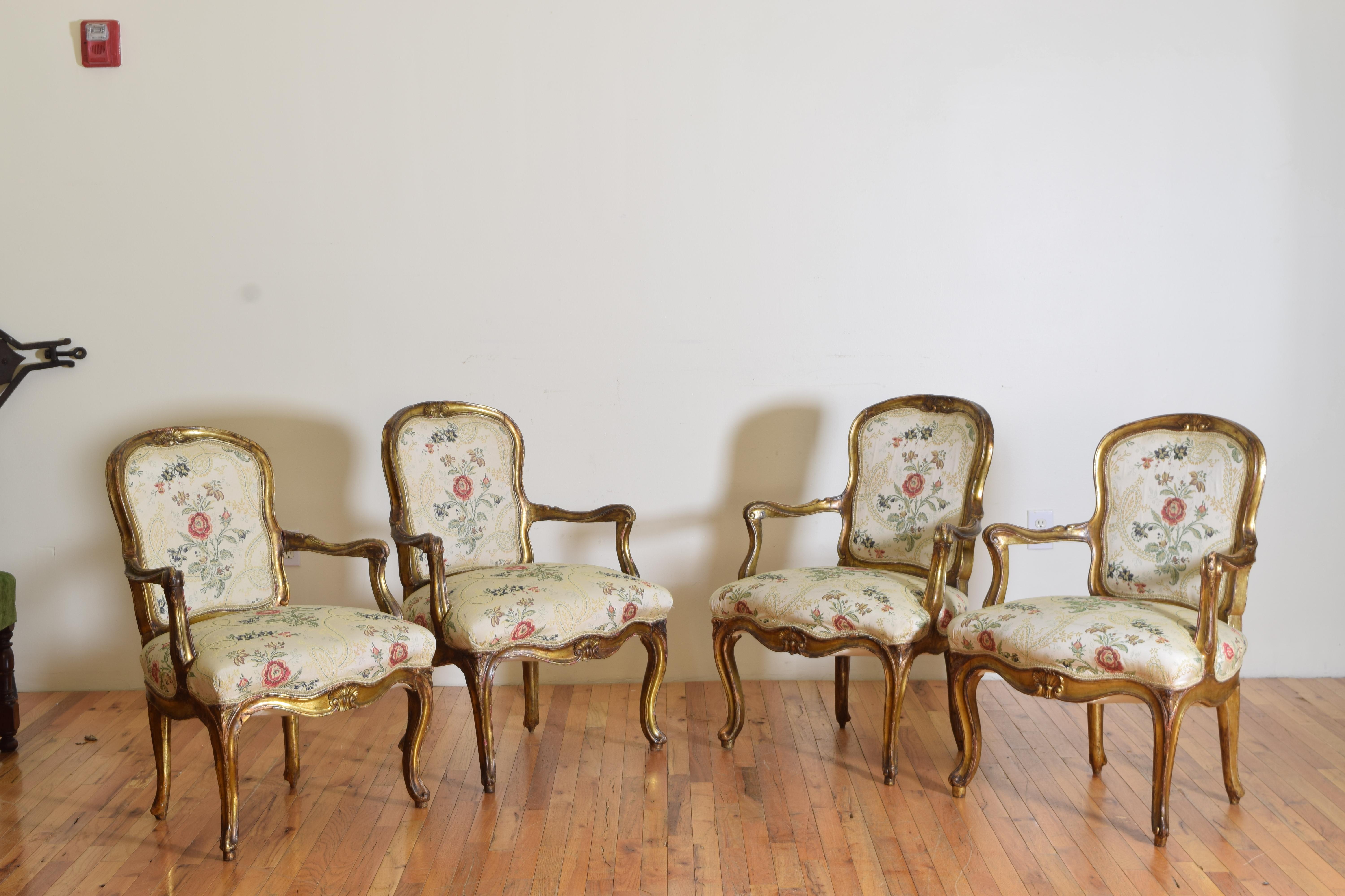 Hand-Carved 18th Century Italian Rococo Set of Four Giltwood Arm Chairs For Sale