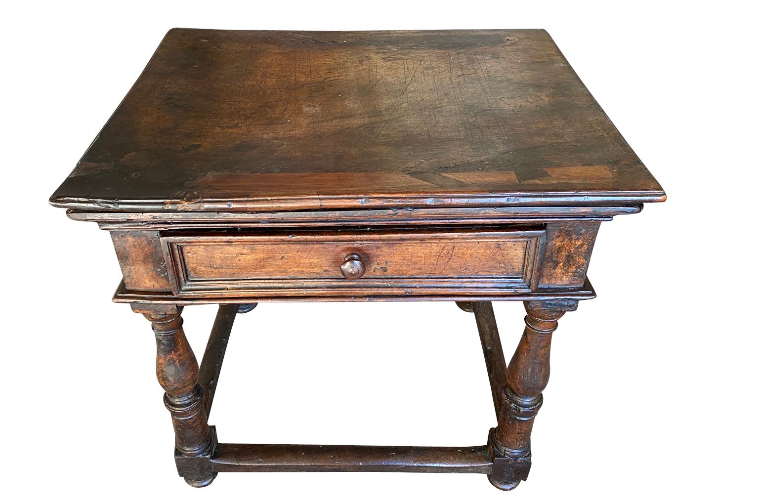 A very beautiful 18th century Side Table from Bologna, Italy. Soundly constructed from stunning walnut with a solid board top, single drawer and nicely turned legs. Gorgeous patina - warm and luminous.