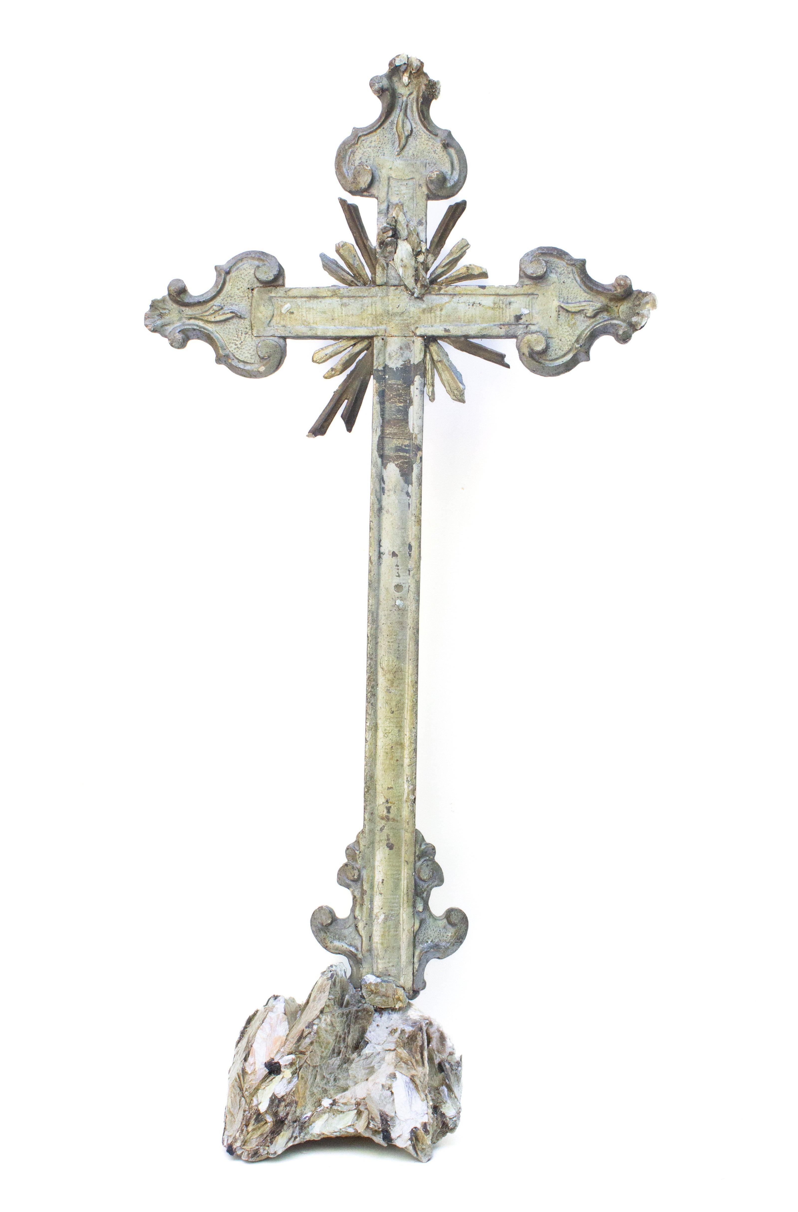 18th century Italian sliver leaf and mecca cross adorned with gold and silver plated crystal points and mica mounted on a mica and tourmaline in calcite matrix base. The crucifix originally came from a church in Tuscany. The gold and silver plated